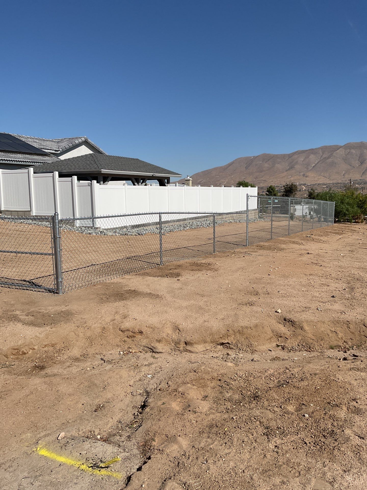 Fence Installation using chain -link by Fence Guys Inc.