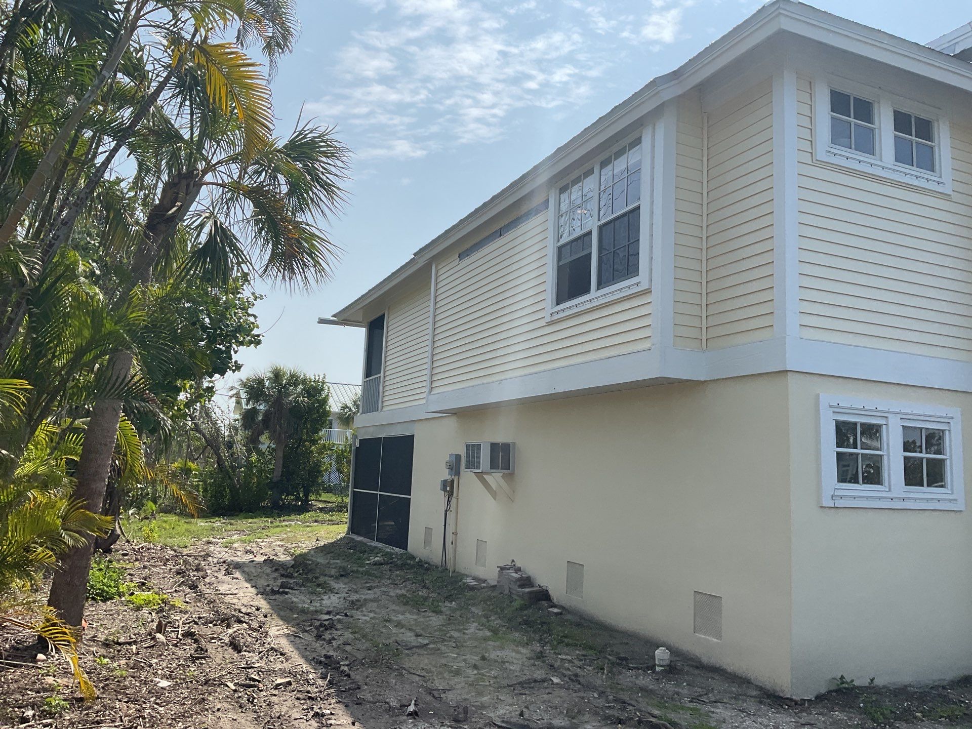 White 6-Inch Seamless Gutters in Sanibel FL by Gutter Professors