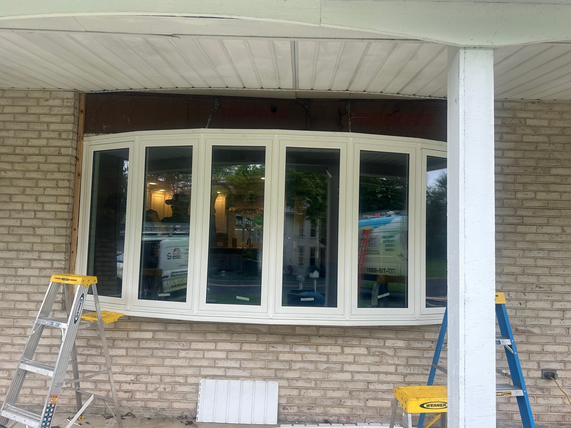 Double Hund Windows and Bow by Aspen Home Improvements