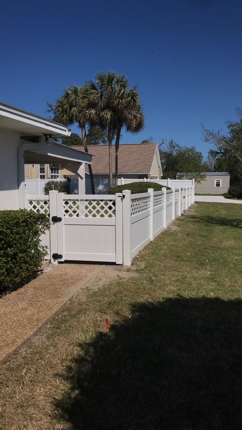 Fence Installation using White Vinyl by Hip Square Fence Inc.