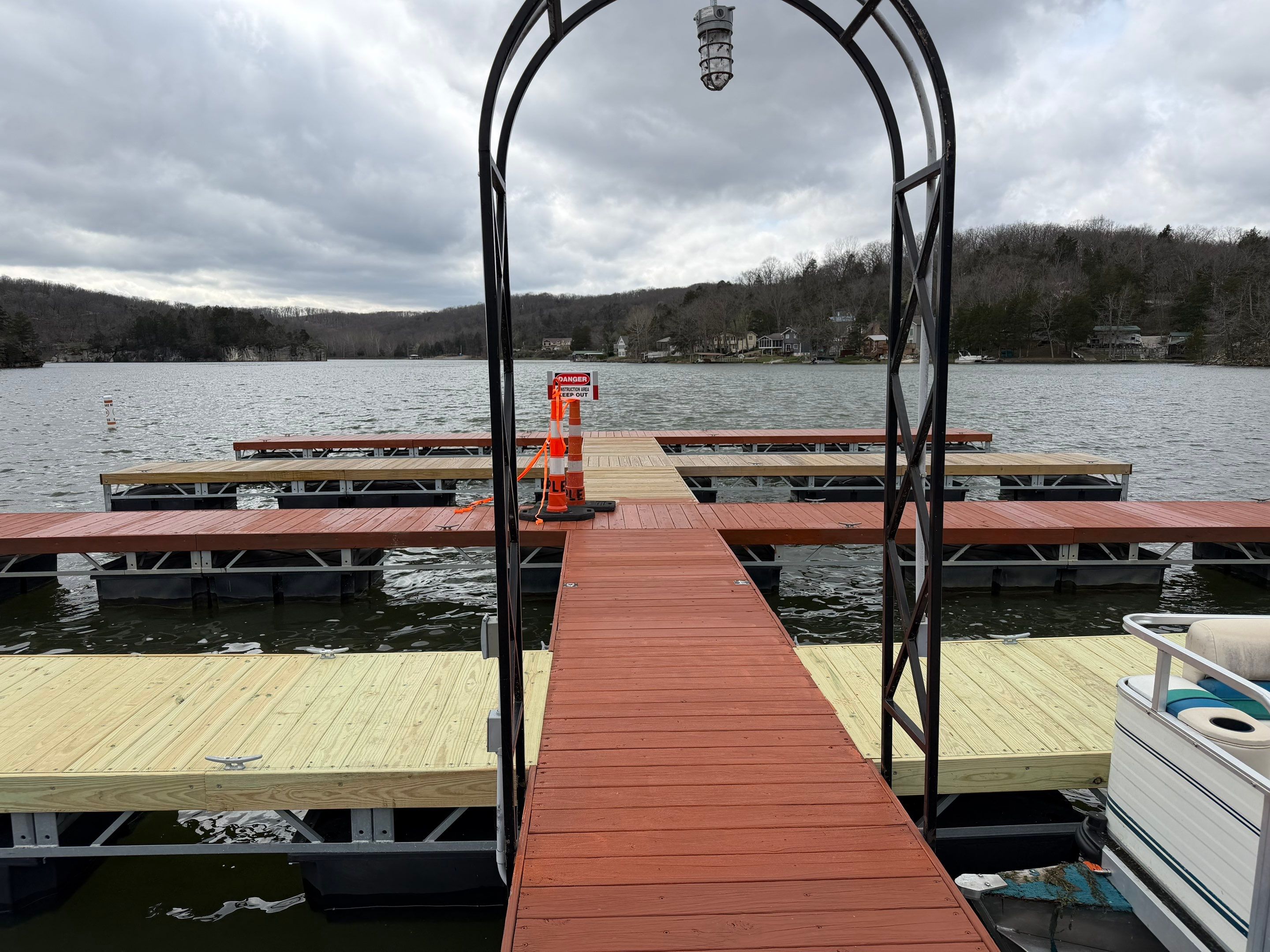 Floating Boat Dock Board Replacement and Staining in New Florence by Acute Roofing And Exteriors