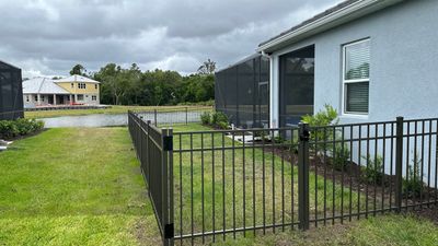 Aluminum Fence Installation using Black 3 Rail Aluminum Fence