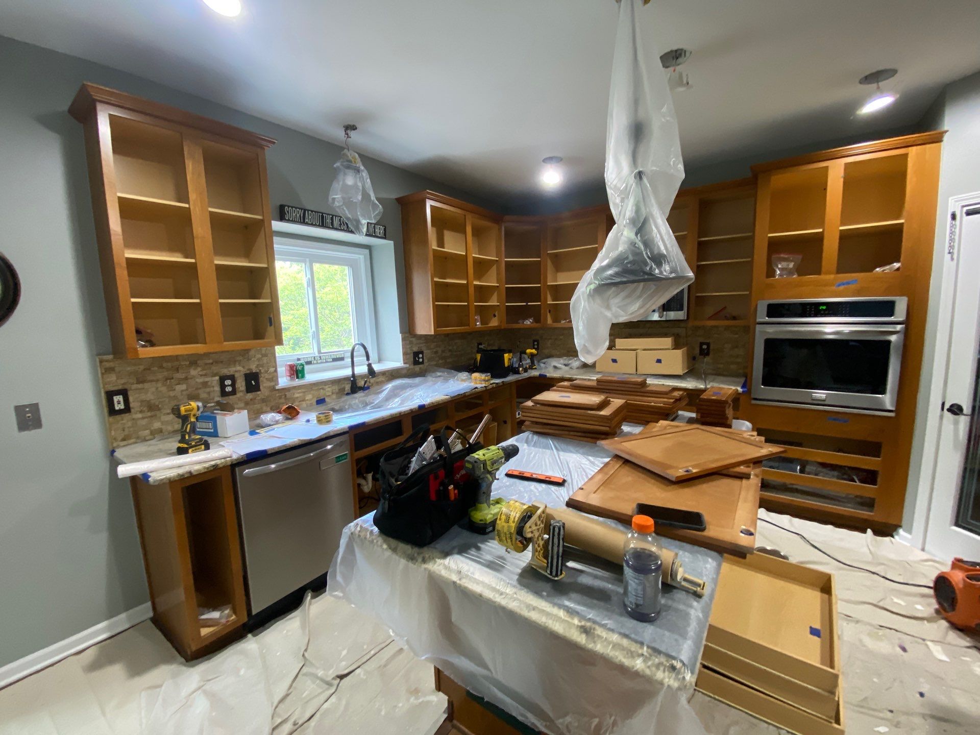 Kitchen Cabinet Refinishing by Top Shelf Painter
