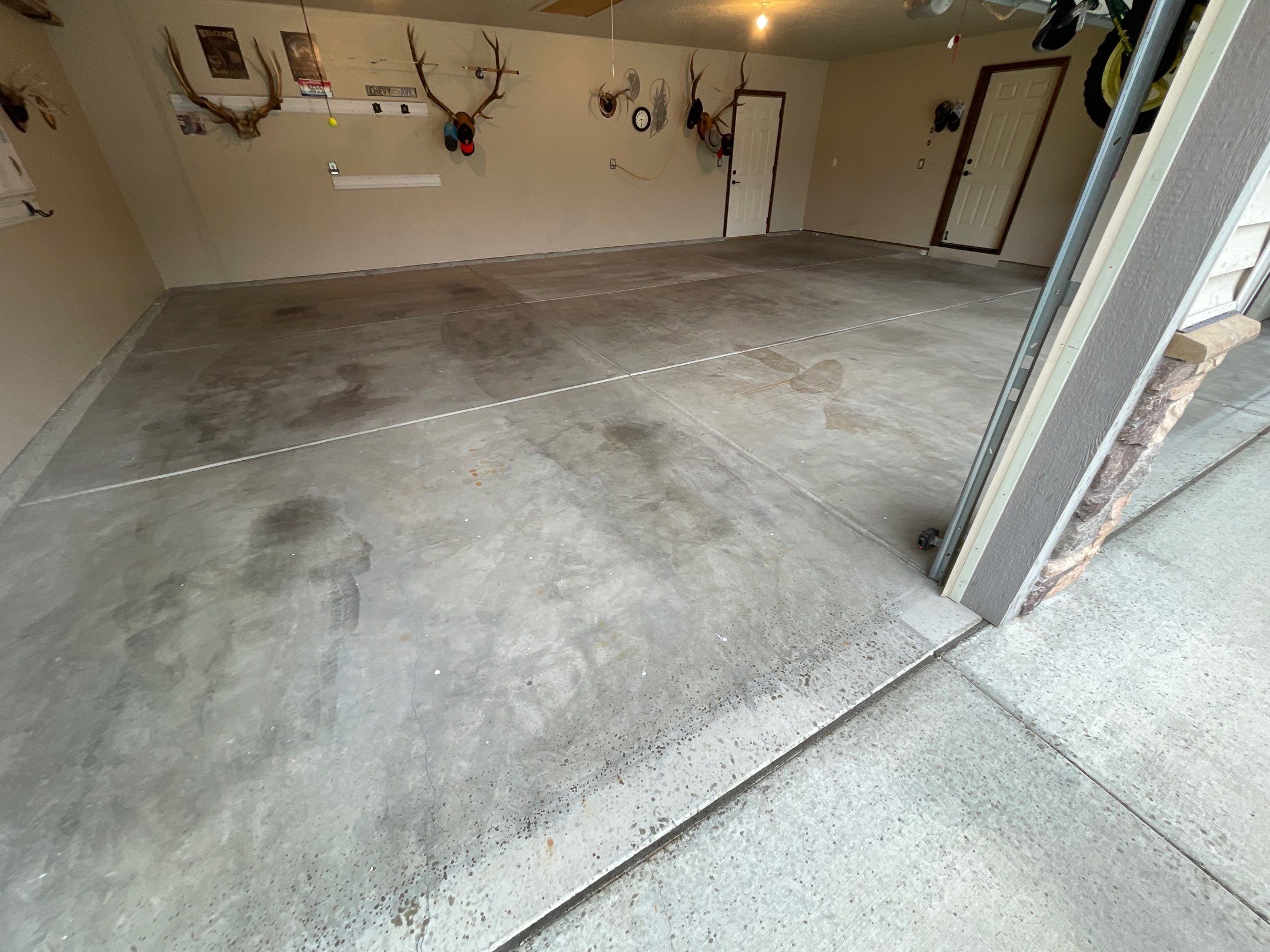 Garage Transformation using Pebble Beach and Front Porch using Greystone by Croc Coatings, LLC