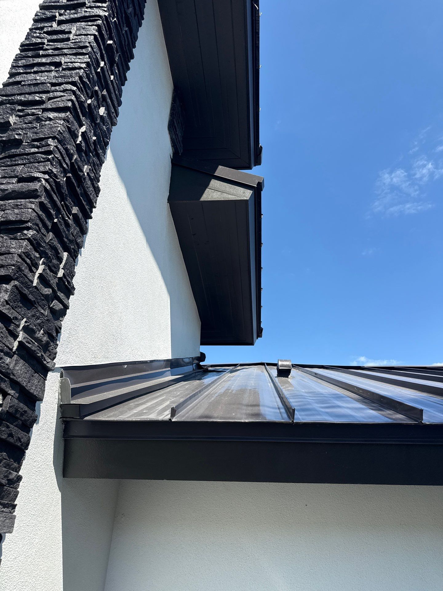 7-Inch Smooth Box Seamless Gutters using black seamless gutters in Siesta Key Fl by Gutter Professors