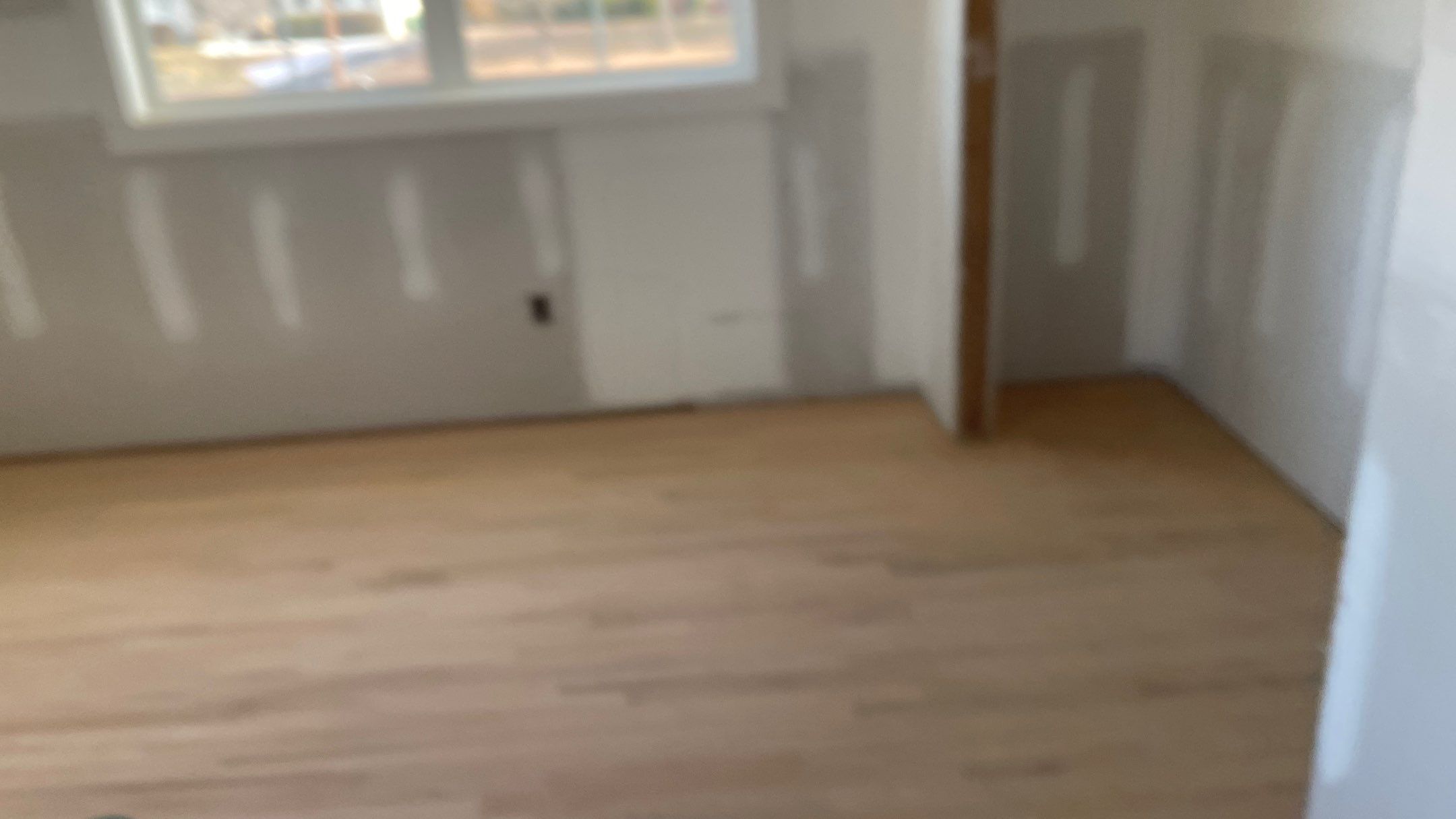 Remodeled Home with new tile floors, Showers and Refinished Oak Floors with stain and Waterbased Finish by Footprints Floors of Coastal Carolina