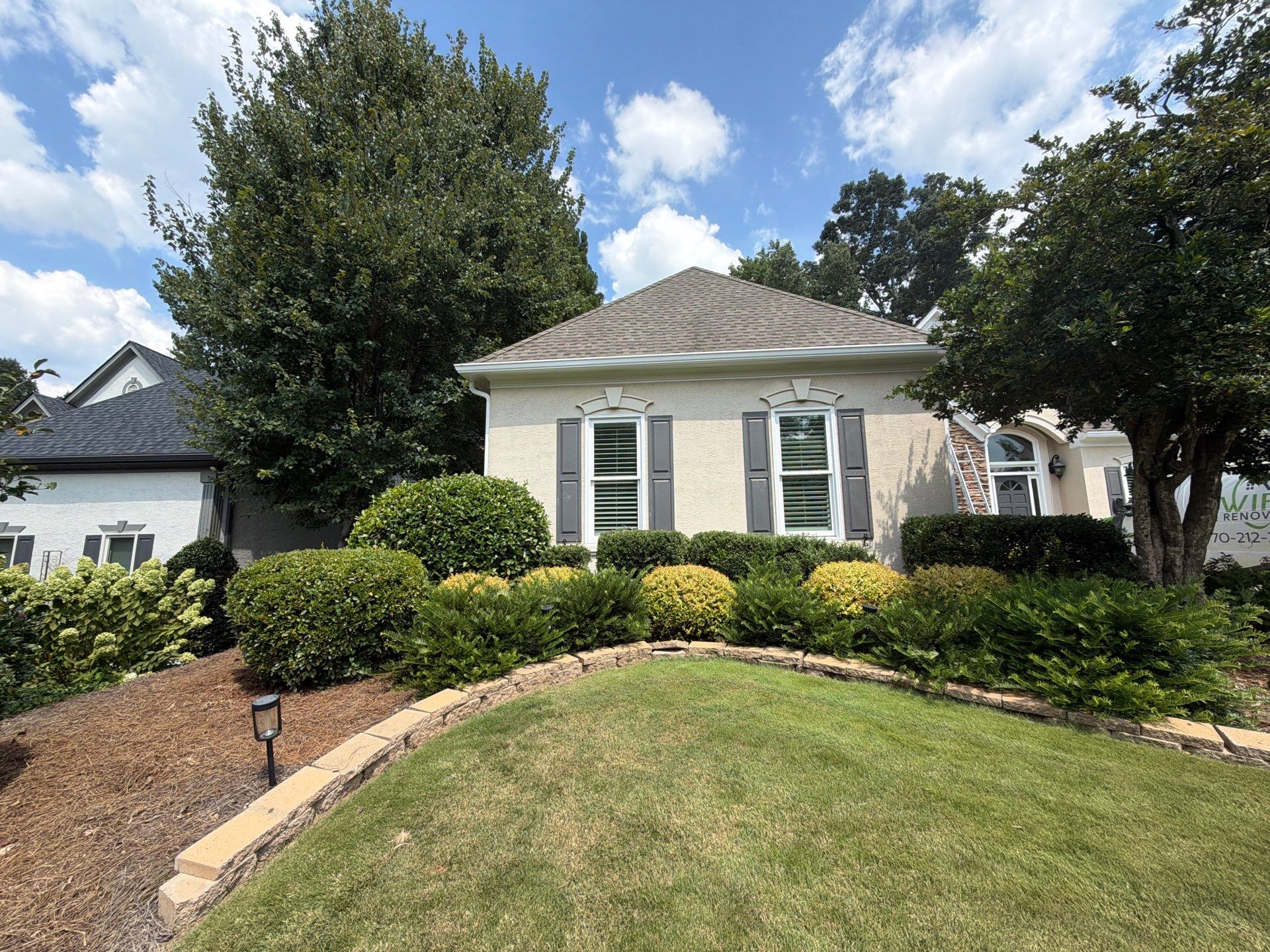 Multi-Story Stucco Home Exterior Painting and Garage Refresh in Marietta by Swift Home Renovations 