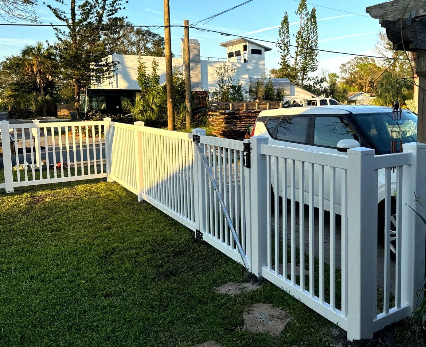 Vinyl Fence Installation using 6Ft White Vinyl Privacy Fence and a 4Ft White Vinyl Picket Fence by Asap fence and gates, LLC