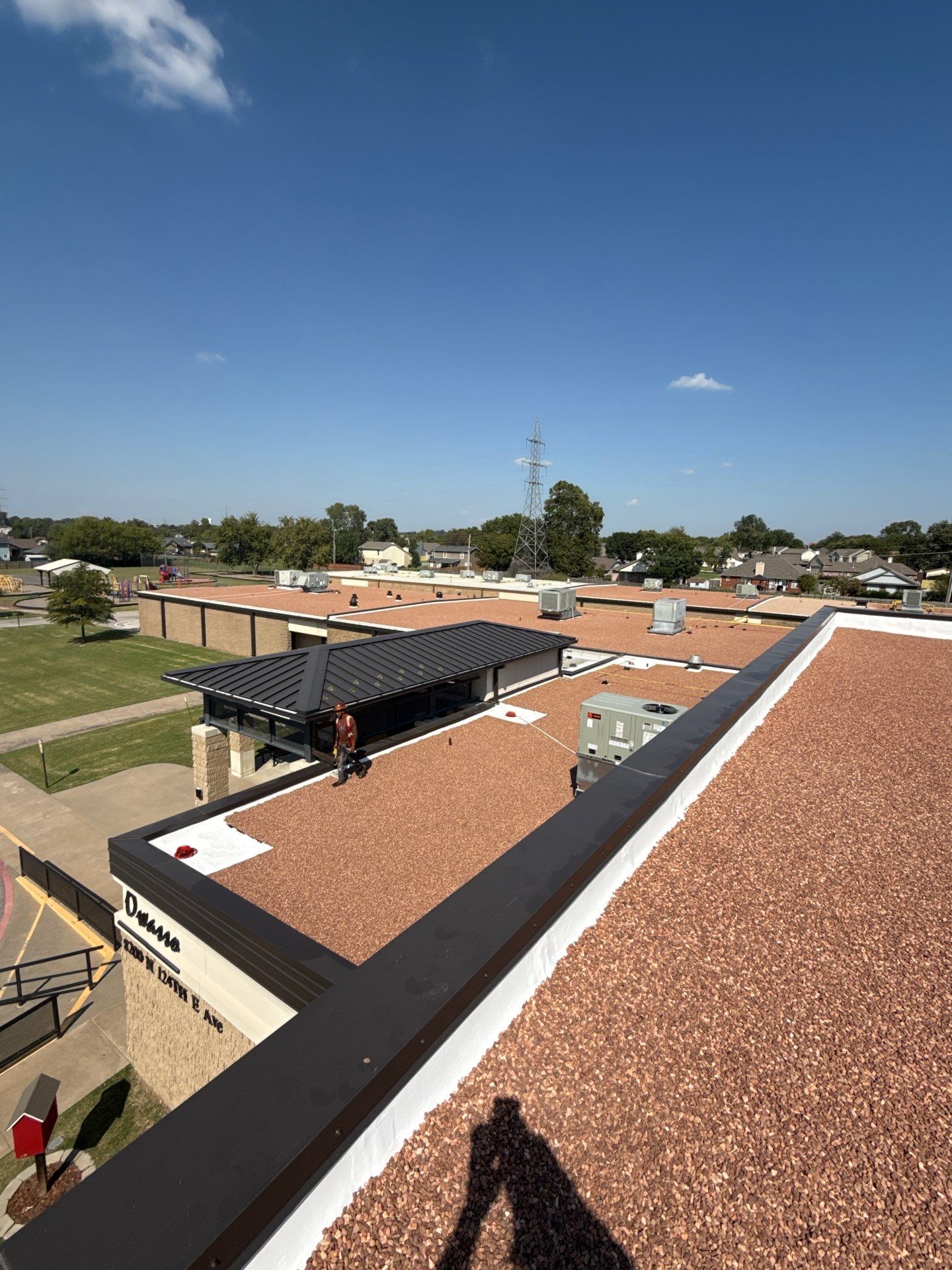 Mills Elementary School Commercial Re-Roof and Moisture Protection by Secondary Rhodes