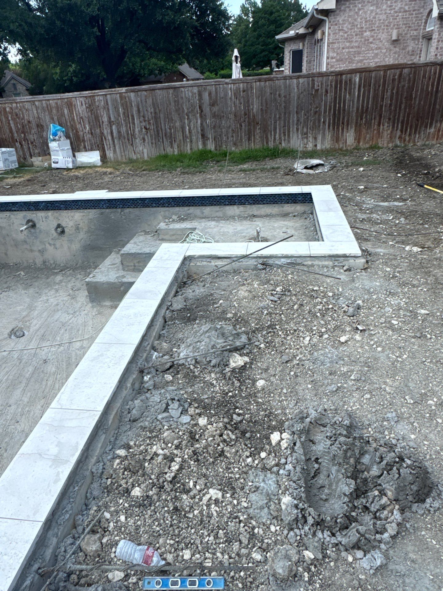 Geometric Pool with Tanning Ledge by Pinnacle Pools and Spas - DFW