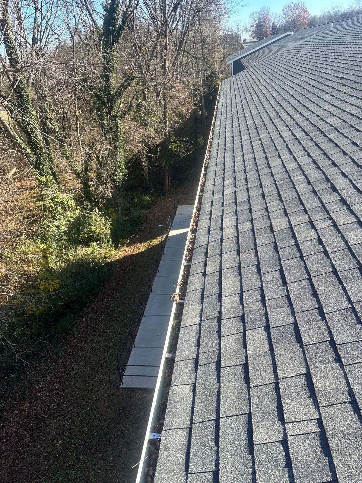 Commercial gutter cleaning Roanoke, VA before photo with filled gutters