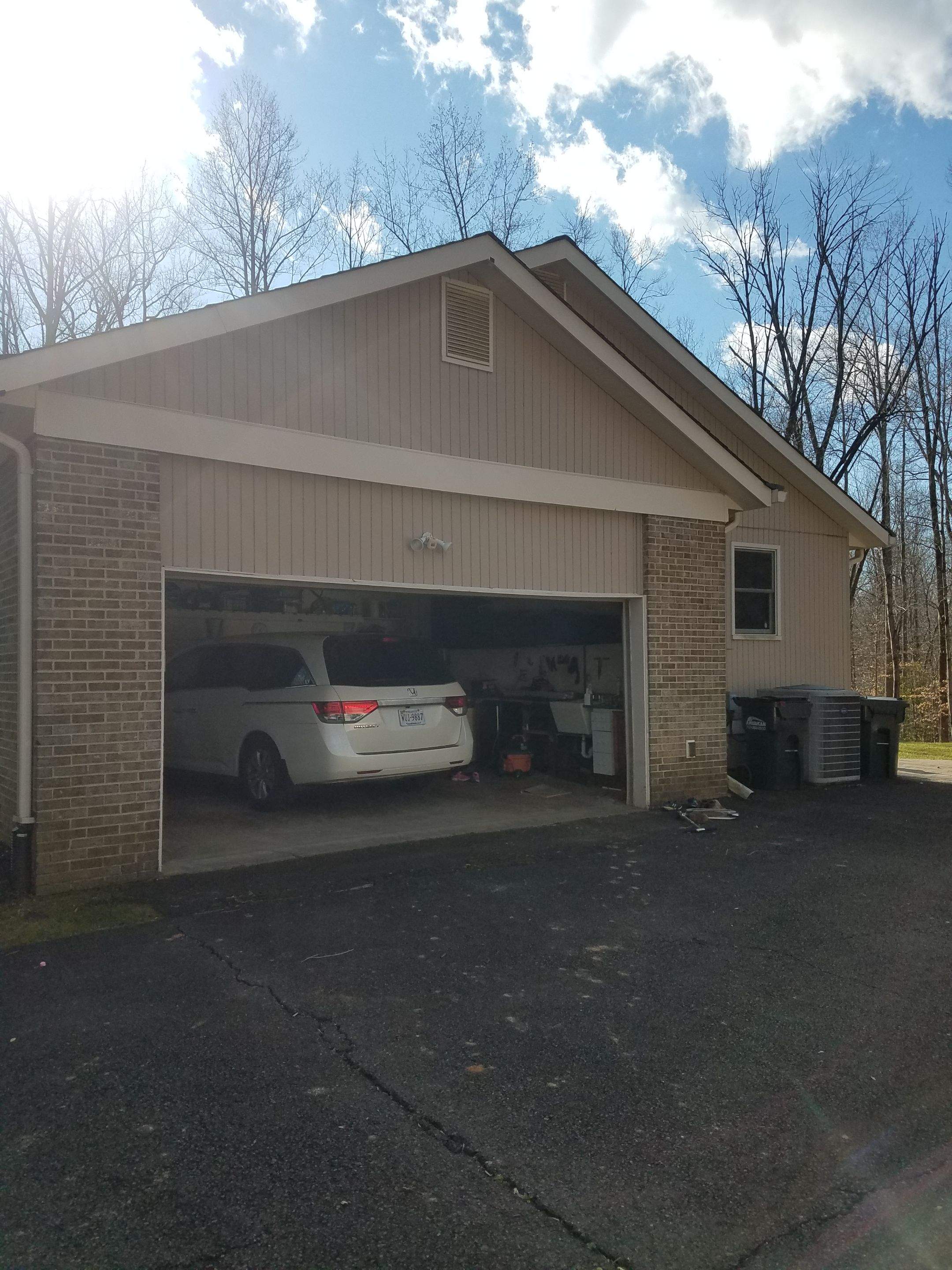 Roof, Siding, Door, and gutter replacement by American Home Contractors