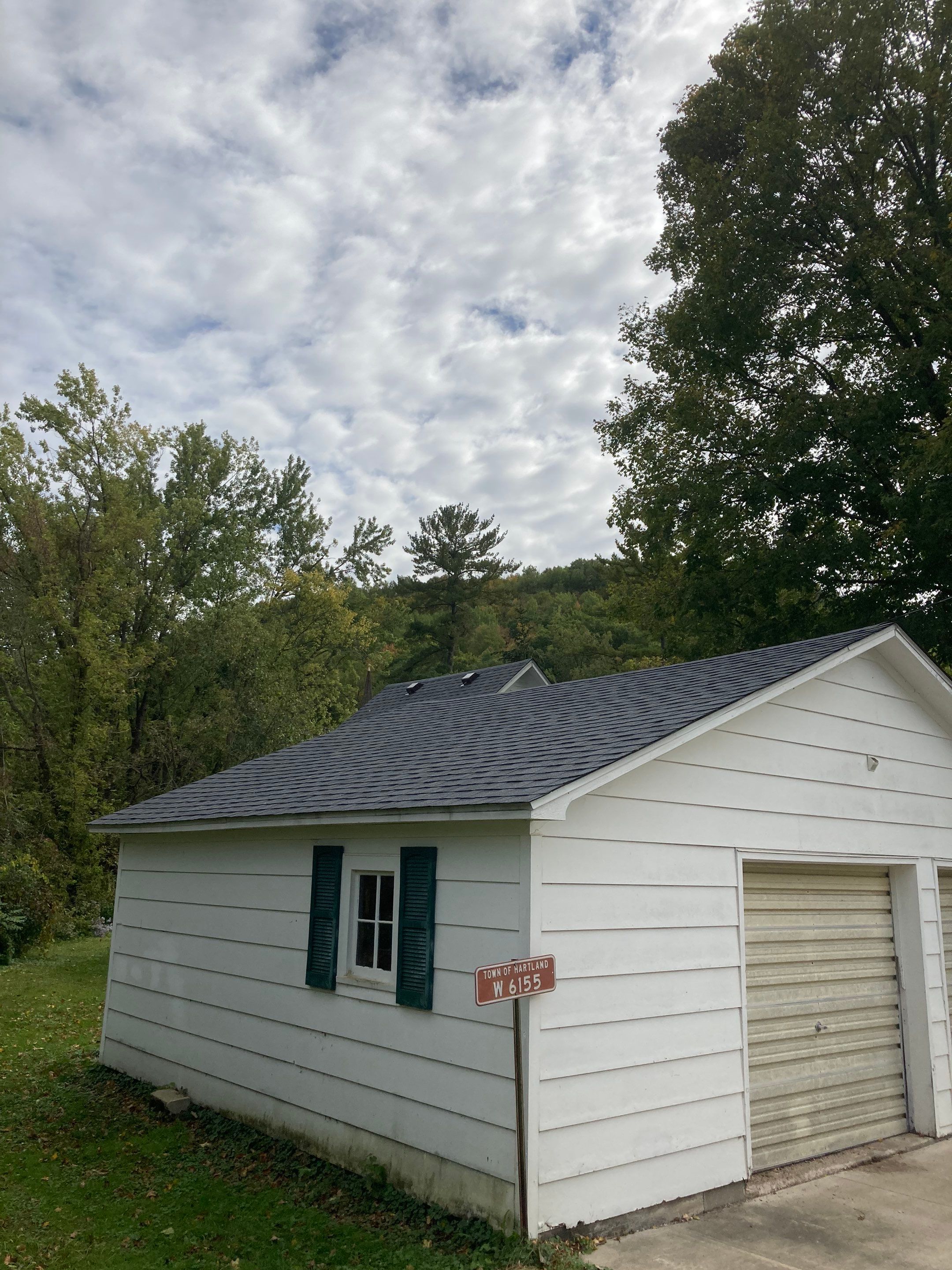 roof replacement on a garage and home by Reasonable Contracting LLC