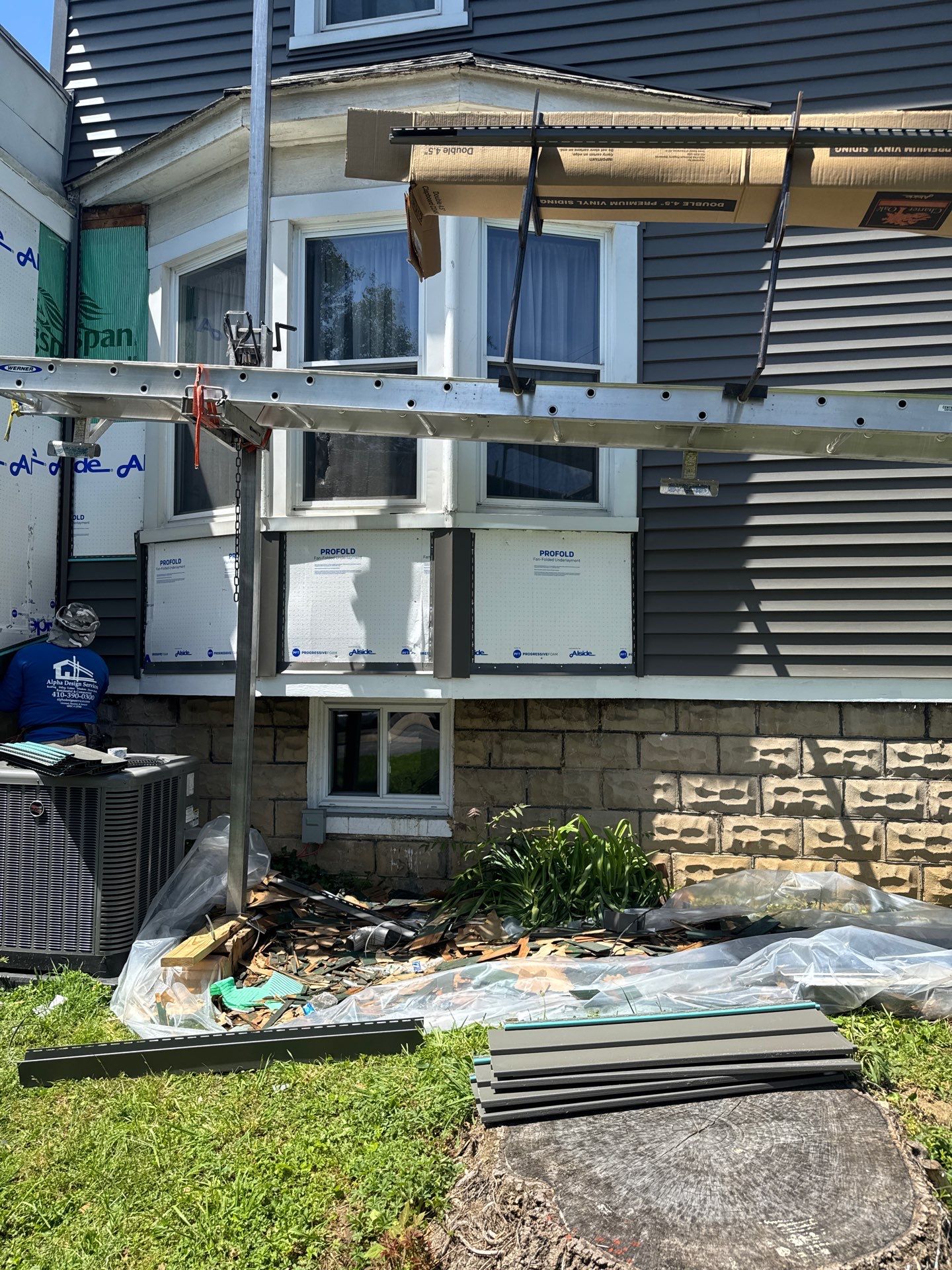 New siding & New Gutters by Alpha Design Services