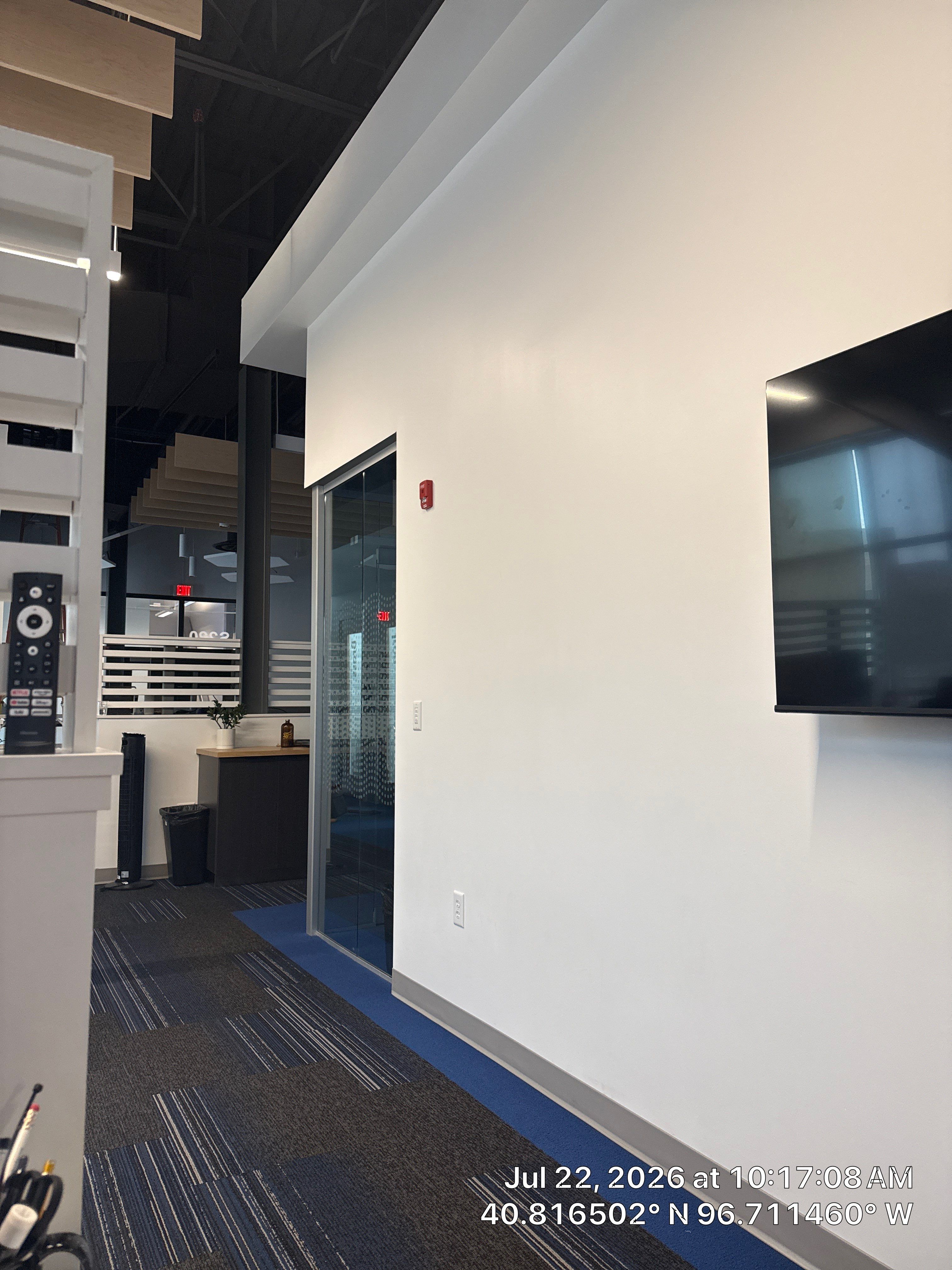 Modern Office Interior Renovation and Acoustic Baffle Installation by CompanyCam Sales Demo