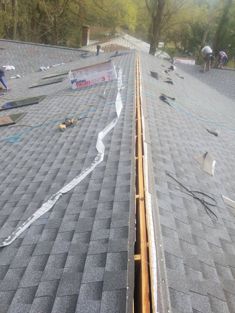 Residential Roofing Installation using Roof Replacement by American Roofing & Construction LLC