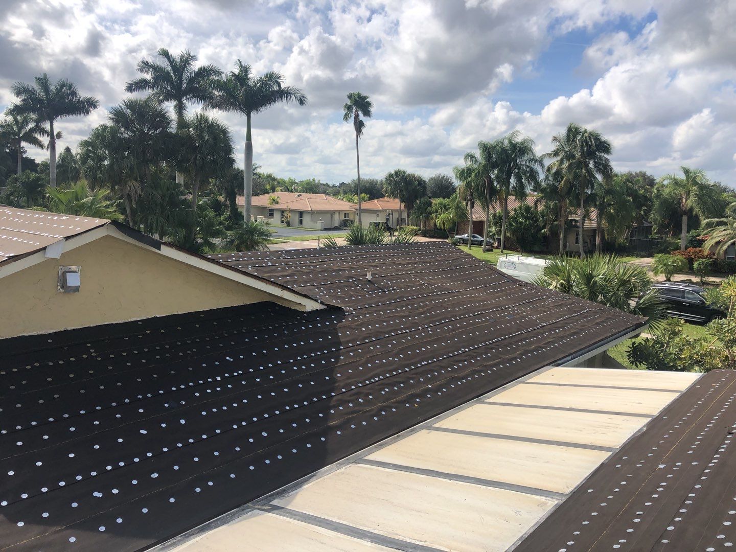 Residential Roofing Installation using 1" Nail strip metal roof by BLUES BROTHERS ROOFING