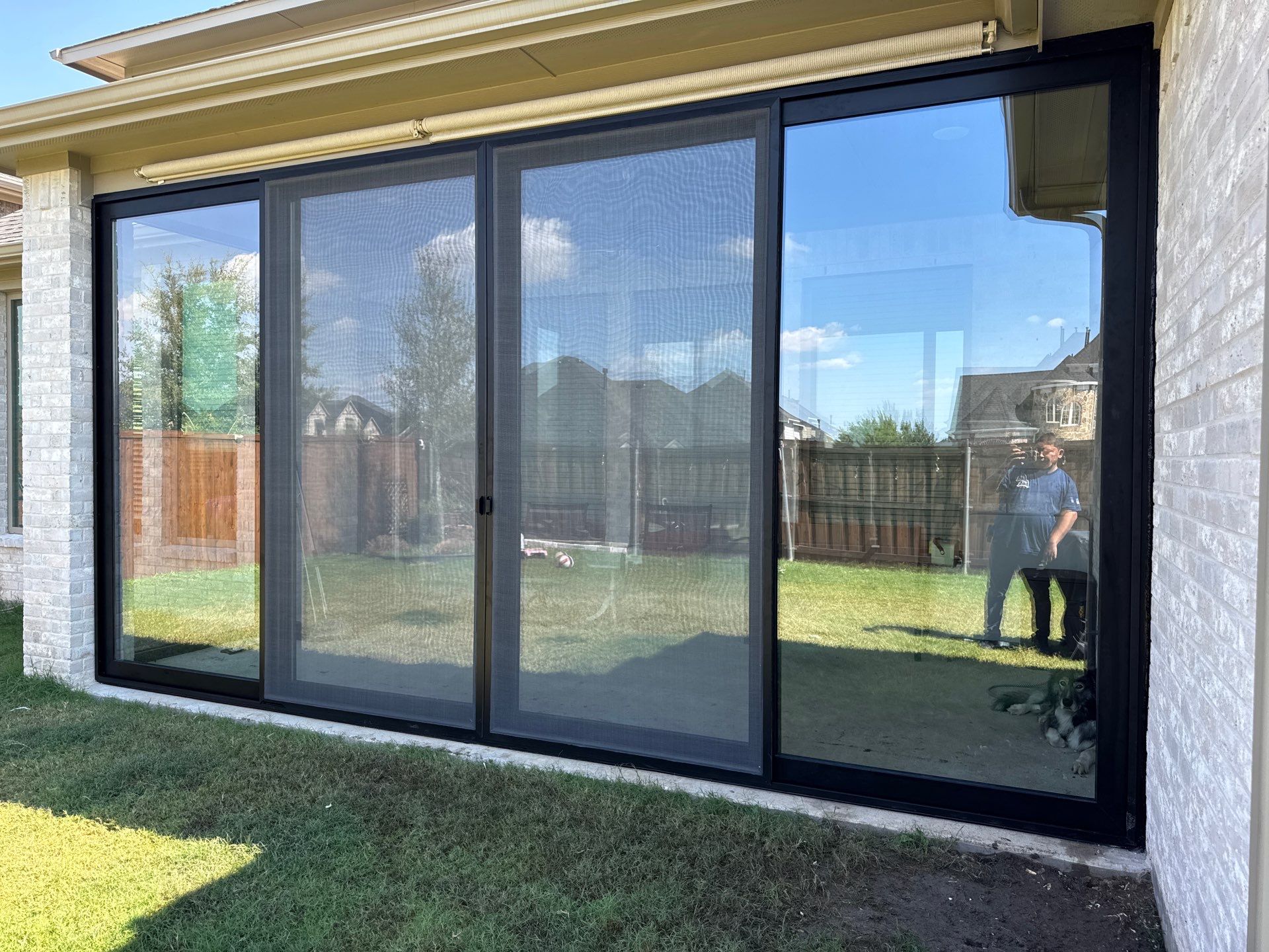 Year-Round Bonus Room: Patio Enclosure Featuring 16ft Seamless Sliding Glass by Tibi Soli LLC