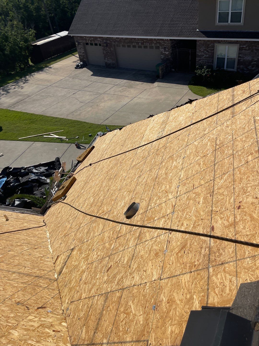 Residential Roofing Installation using Roof Replacement by American Roofing & Construction LLC
