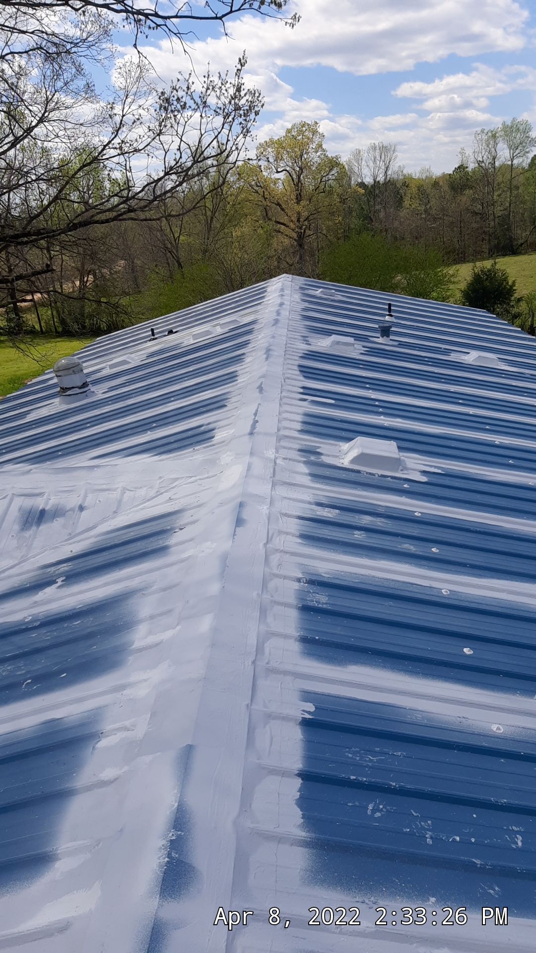 Commercial Roofing Installation using Aldocoat Coatings by Hostetler Roofing