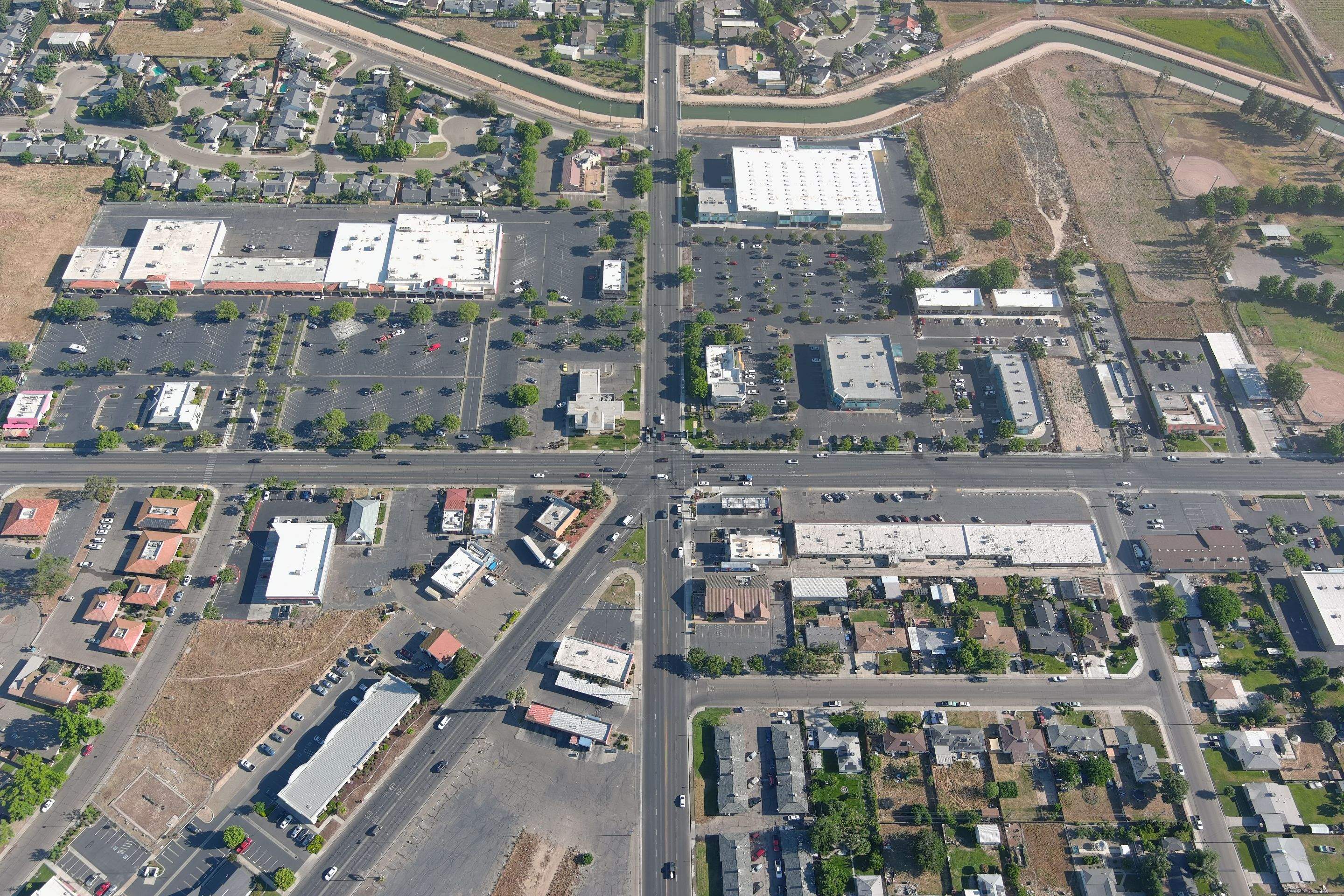 Metal roof restoration on commercial roof using Conklin Benchmark/ PUMA XL acrylic coatings over metal and foam by Straight Edge Roofing Inc