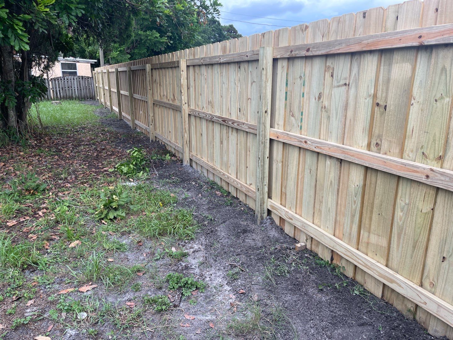 Sarasota, FL 6ft. Tall Treated Board on Board Wood Fence by Asap fence and gates, LLC