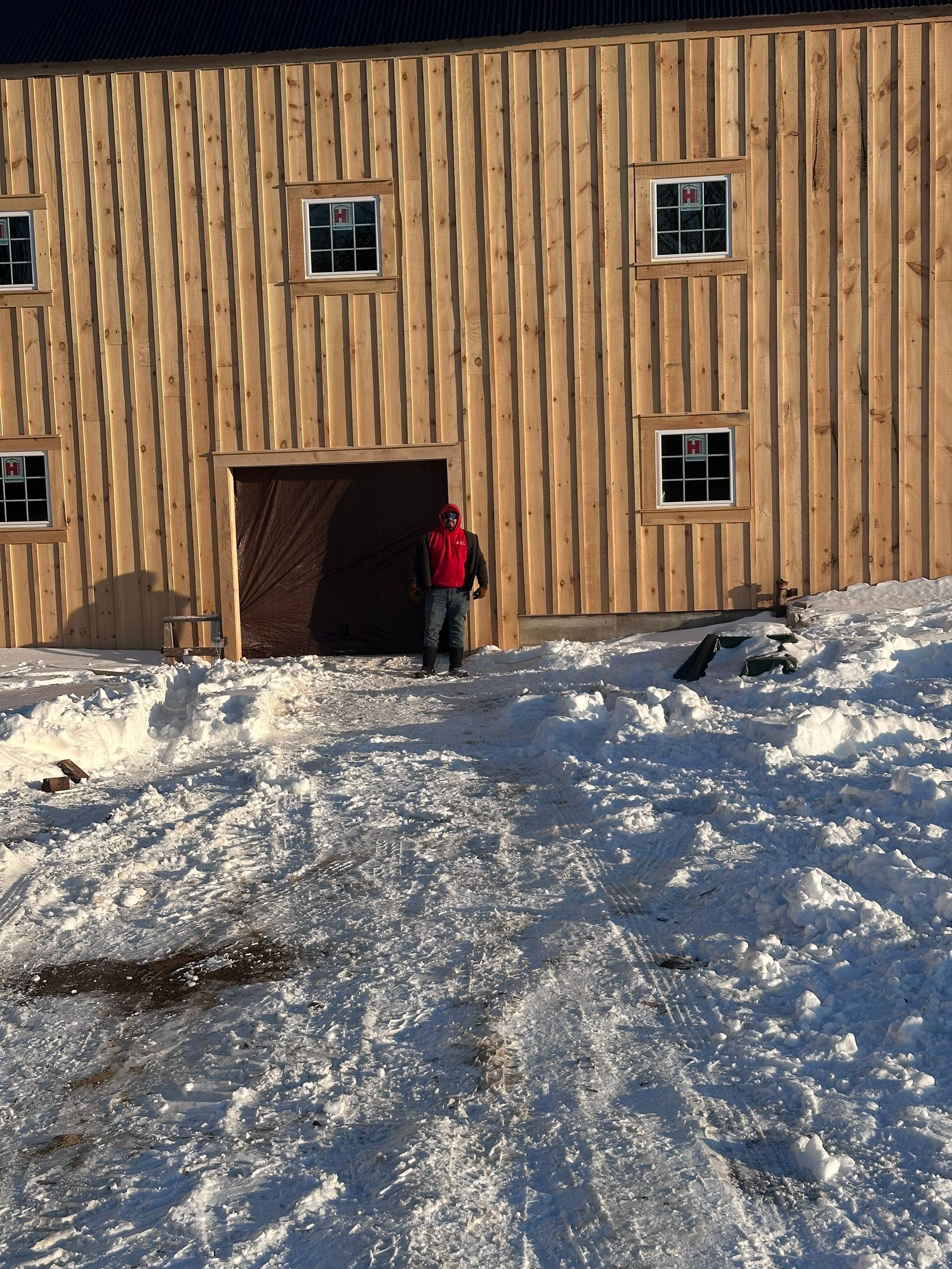 Barn Restoration and Board-and-Batten Siding Installation in Hansons Ridge by B's Roofing & Construction LLC