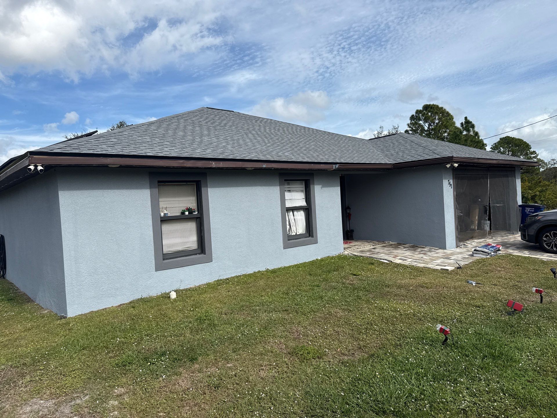 Black Seamless Gutters & Soffit/Fascia in Lehigh Acres FL by Gutter Professors