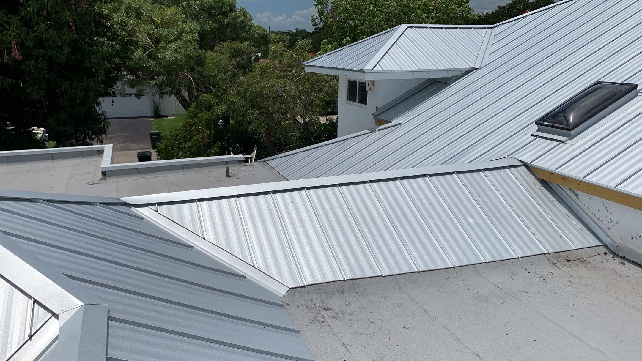 Residential Roofing Installation using 1" Nail strip metal roof by BLUES BROTHERS ROOFING