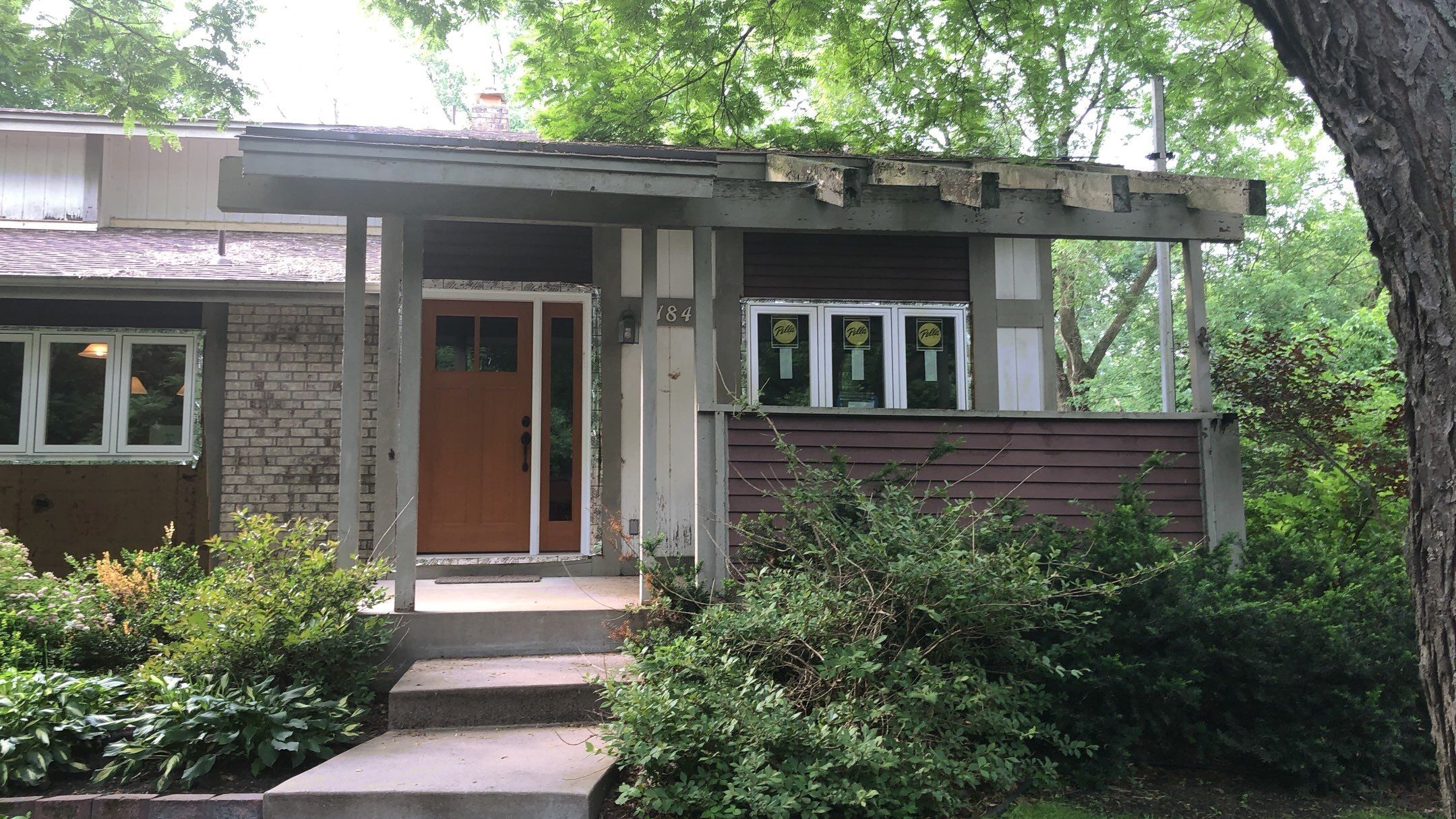 Siding Installation using LP SmartSide and Pella Vinyl Windows by MODERN EXTERIOR SYSTEMS