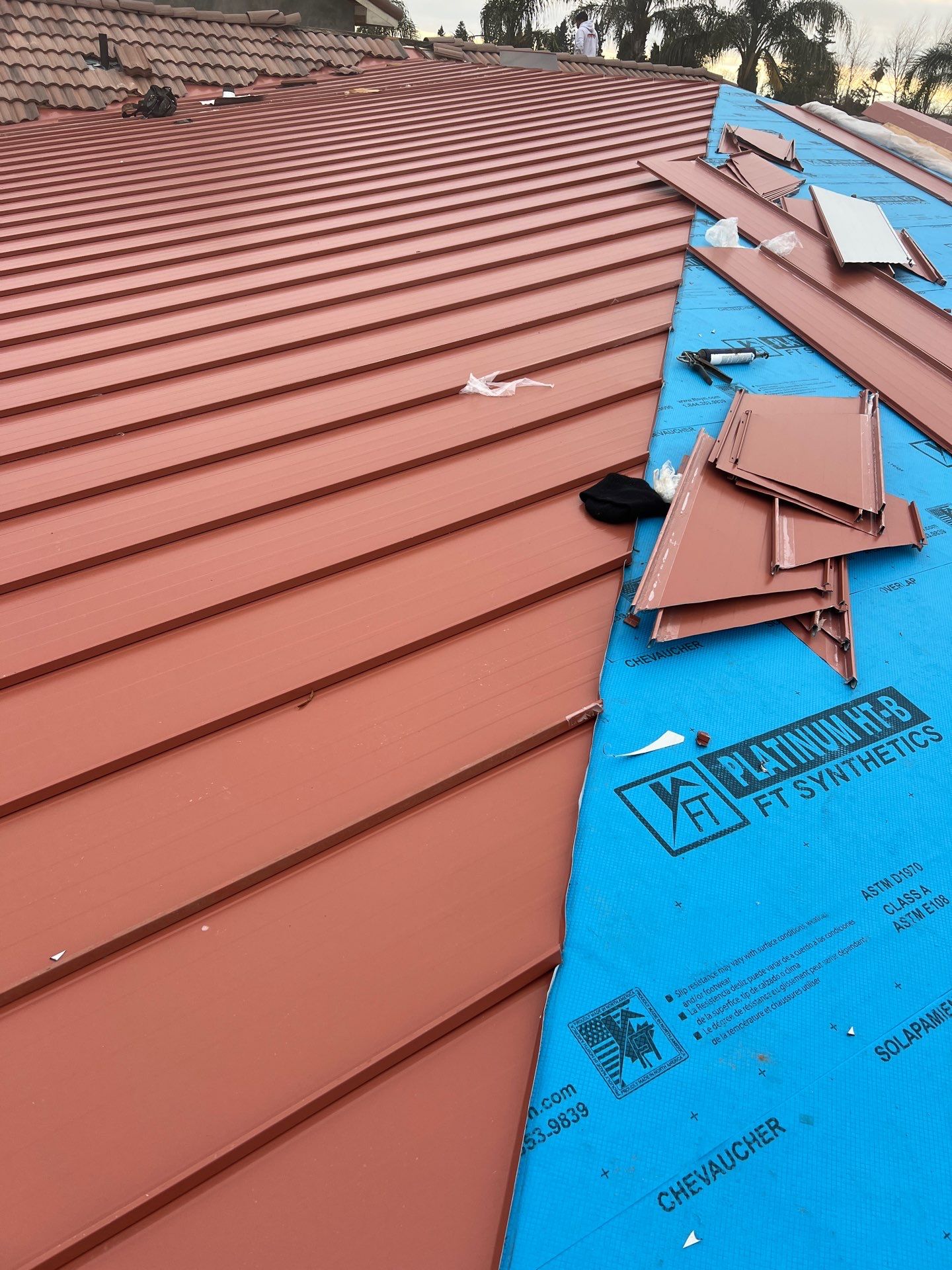 Tile, Metal, and TPO roofing project (new construction) by Straight Edge Roofing Inc