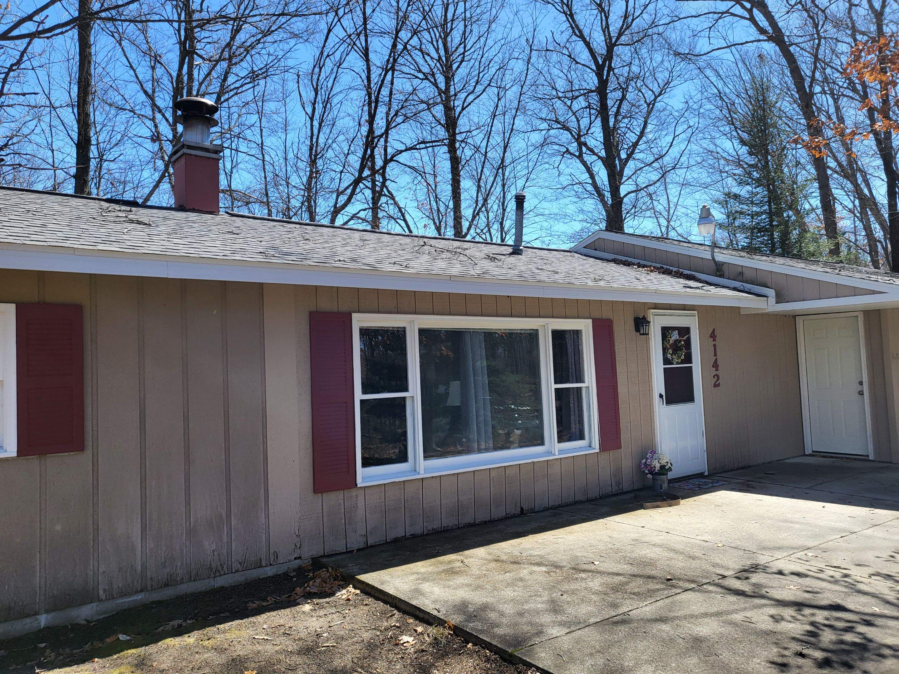 New addition and log siding by Energy Plus Home Improvements