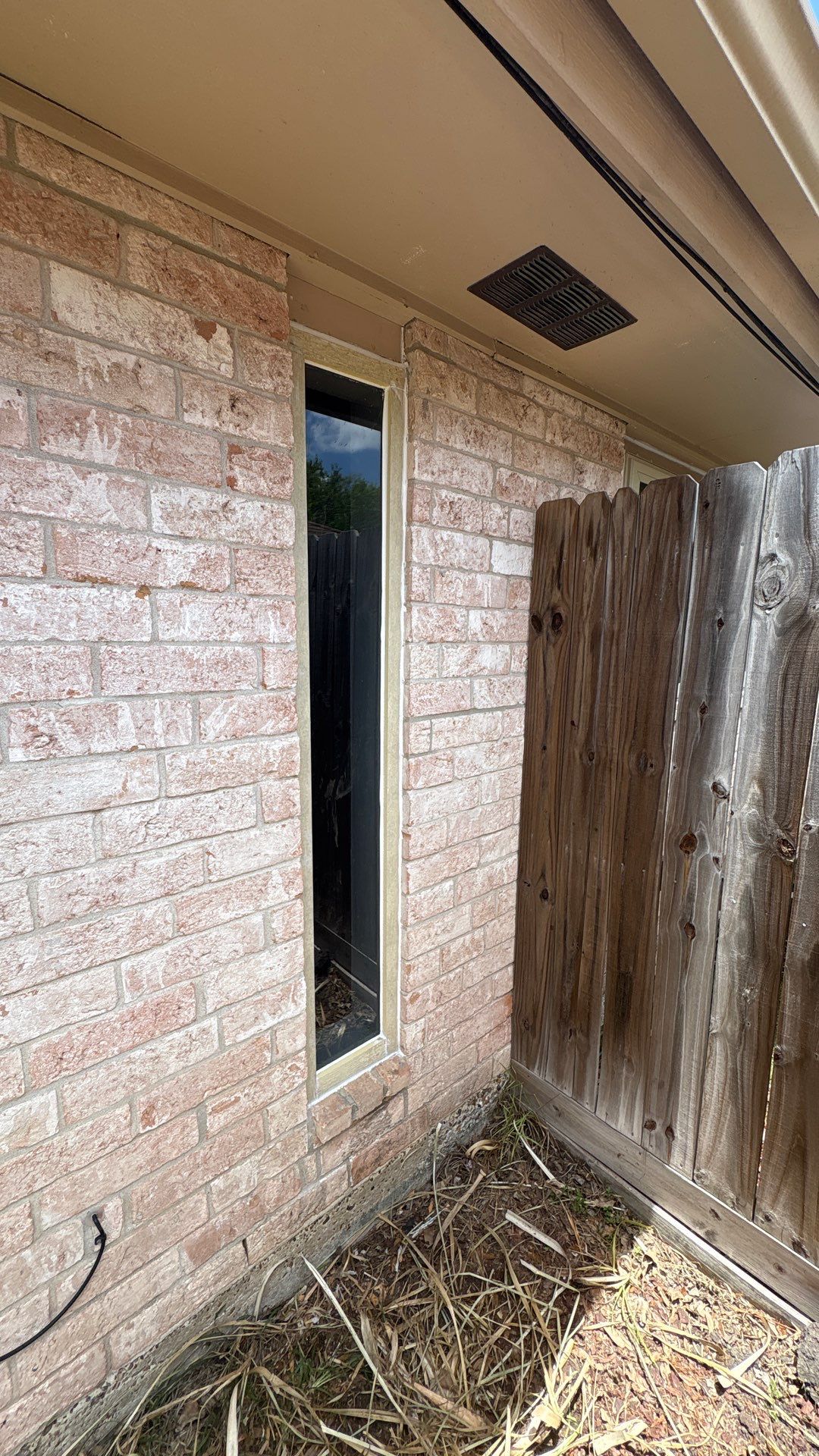 Colored Vinyl Windows to blend into brick by Bayfront Roofing and Construction