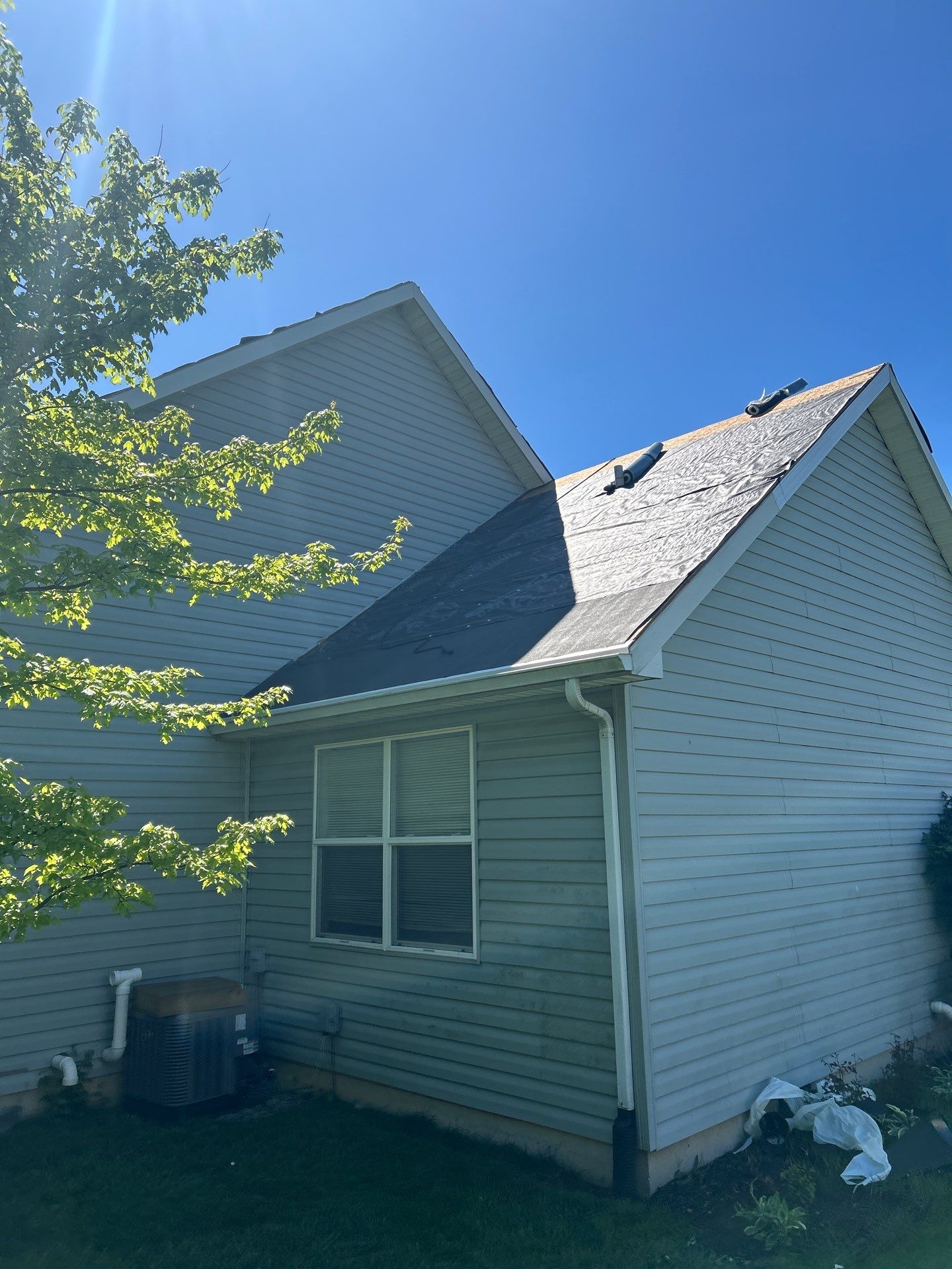 Exterior Installation using Onyx Black Durations and White Siding by WIW Enterprises Inc