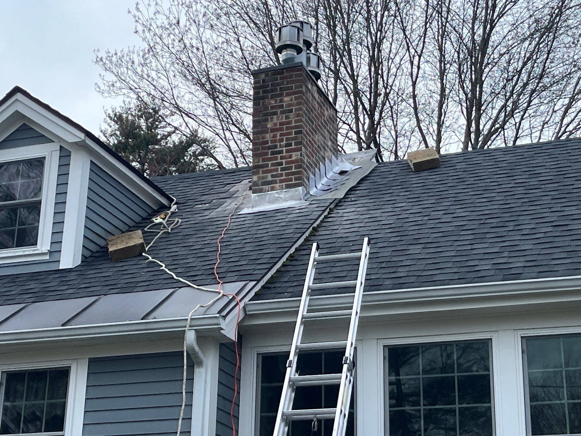Rubber Roof Repair W/Chimney Reflash by Tall pine roofing