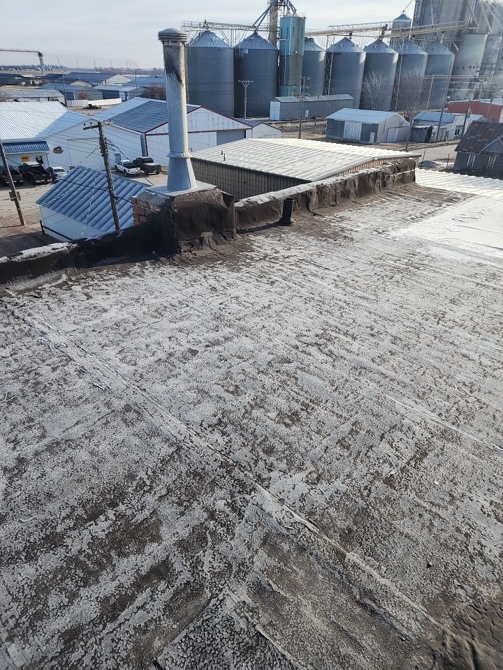 Recover of a downtown building  by Grell Roofing, LLC