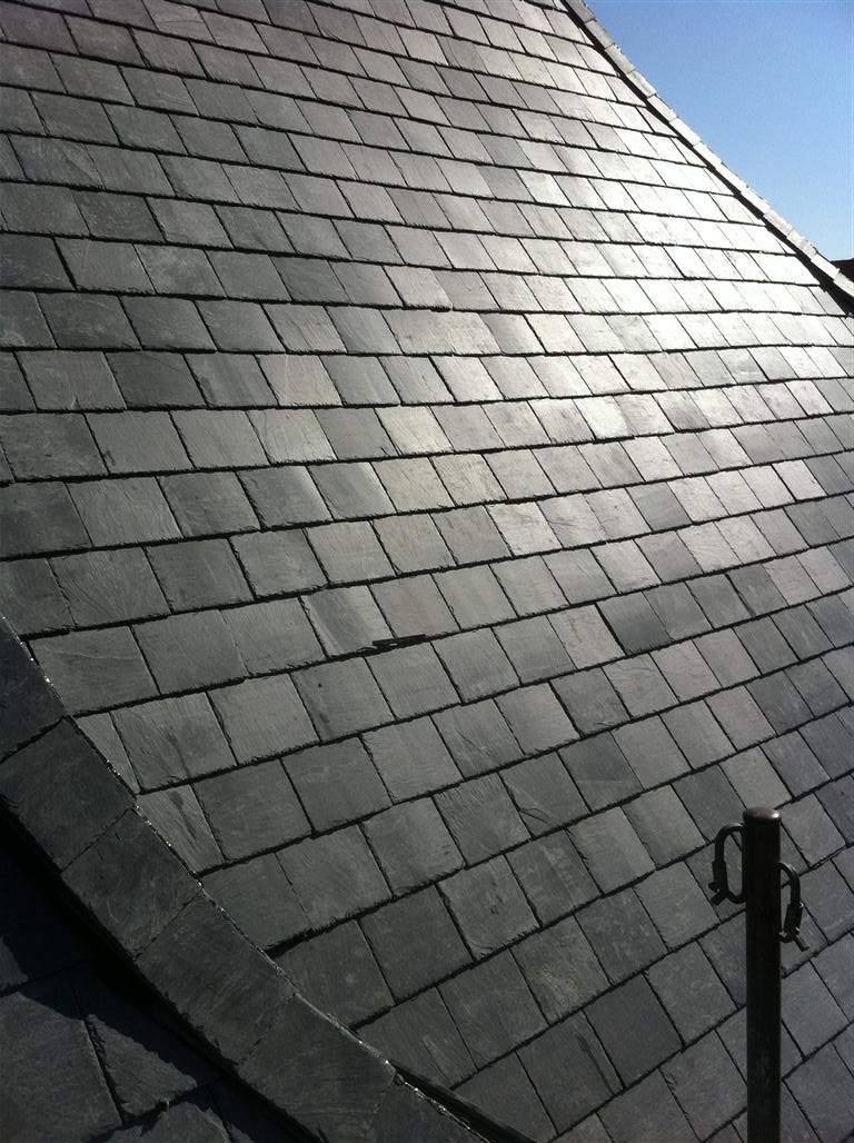Historic Building ROOF REPLACEMNT with GAF TruSlate  on steep slop and Versico 60mil TPO on flat roof by Gorilla Exteriors Contracting, LLC