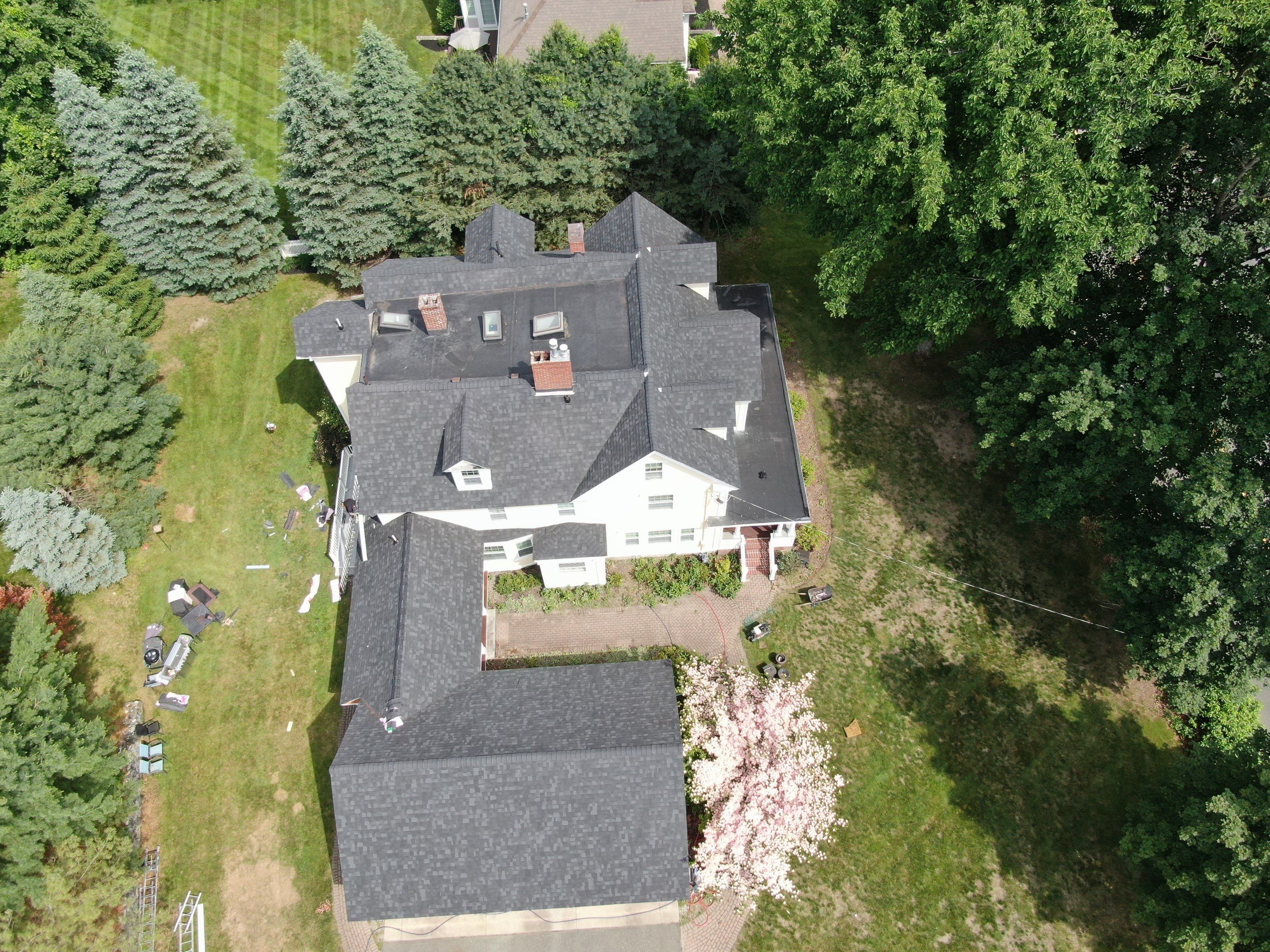 Full Roof Replacement & EPDM Restoration – North Andover, MA by Mighty Dog Roofing of Greater Middlesex County
