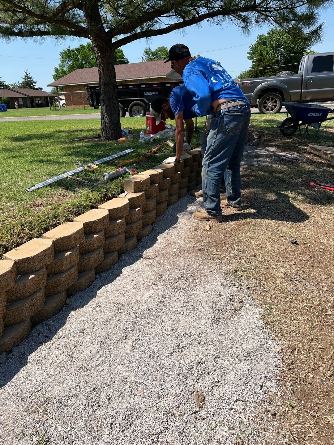 Retaining Wall using Rocks by Clays Services Inc