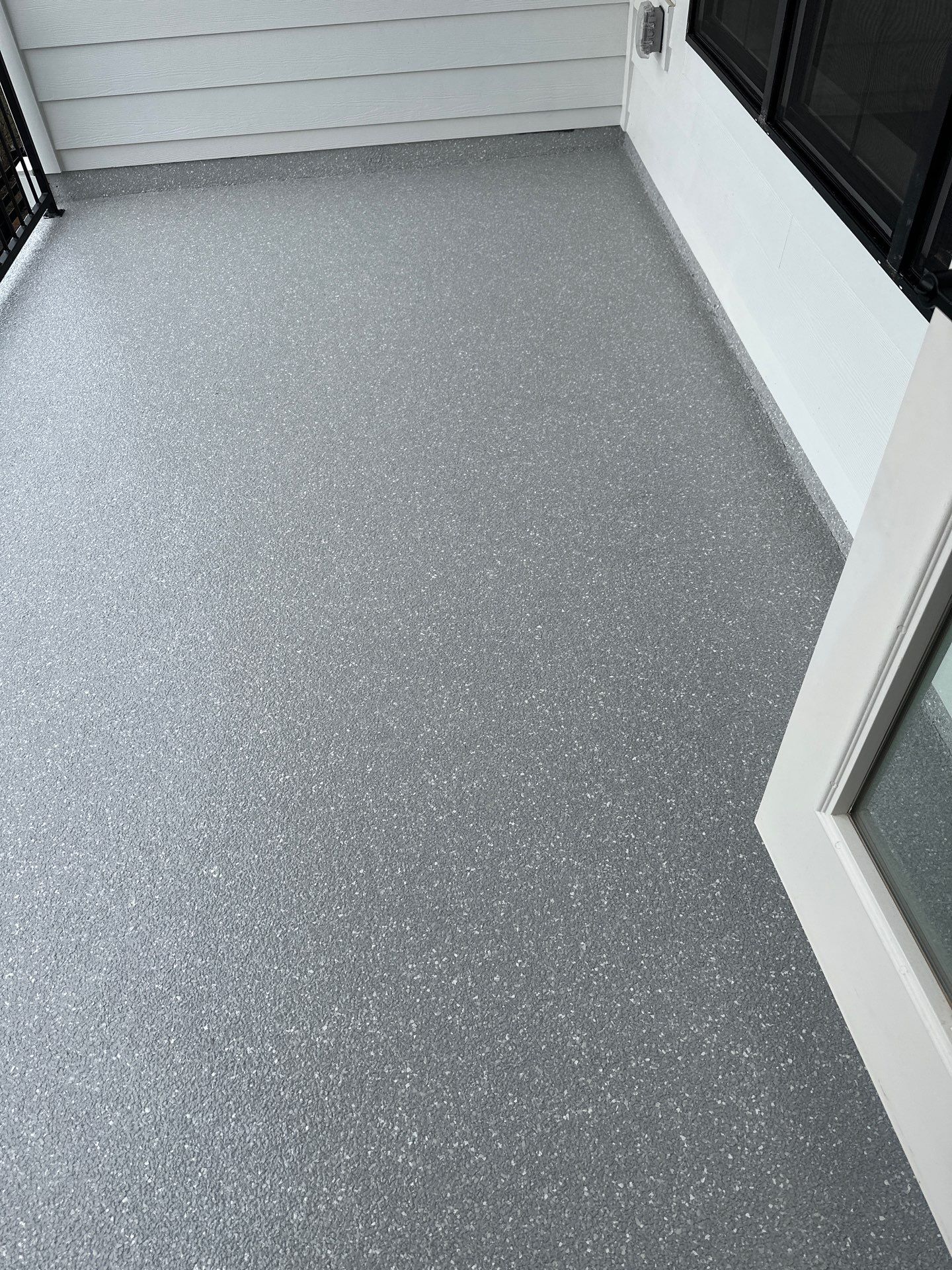 Patio Floor Coating using Custom Color by My Garage Floor Guys