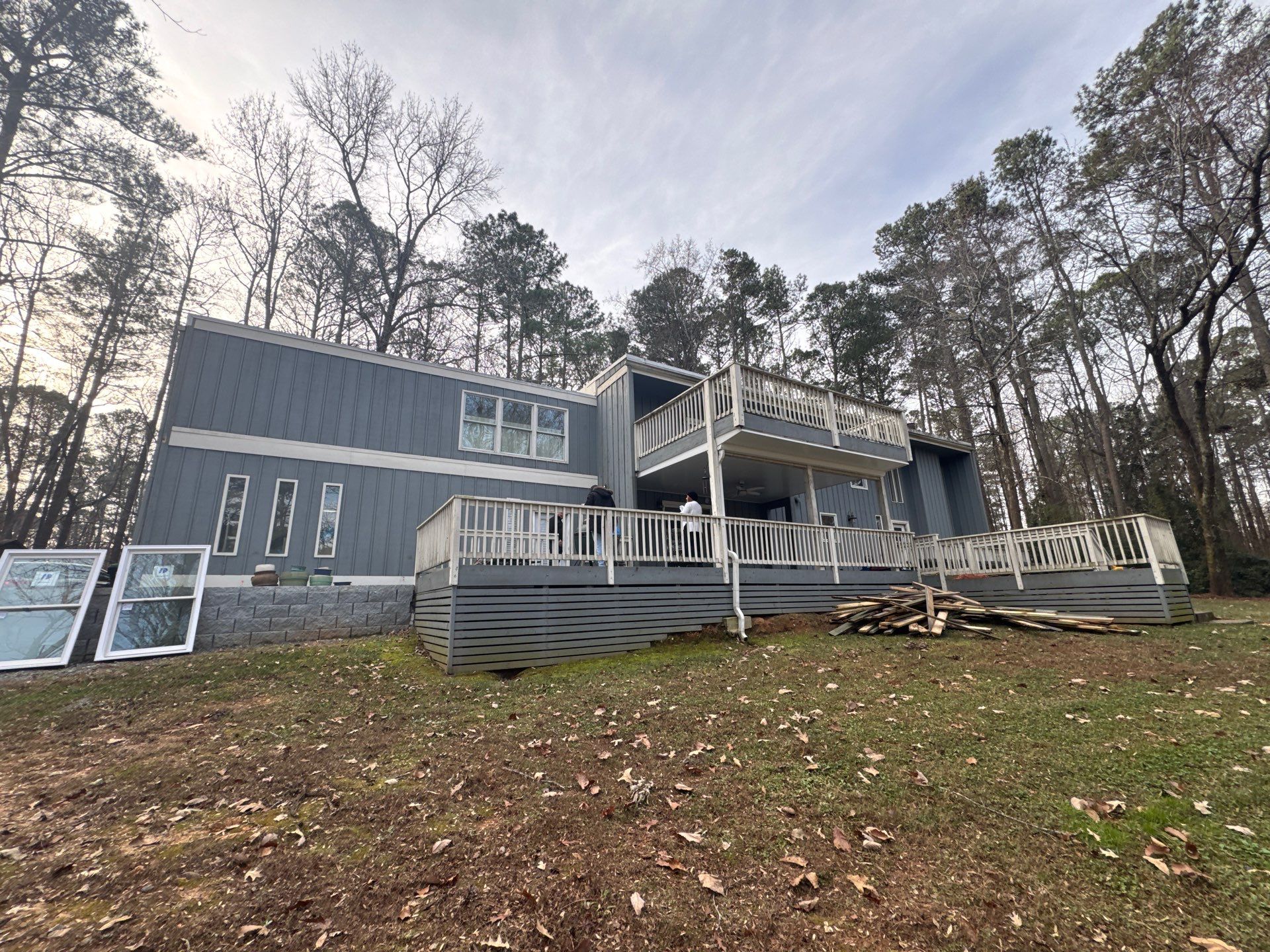Full Exterior Transformation With Modern Black Finish by Swift Home Renovations