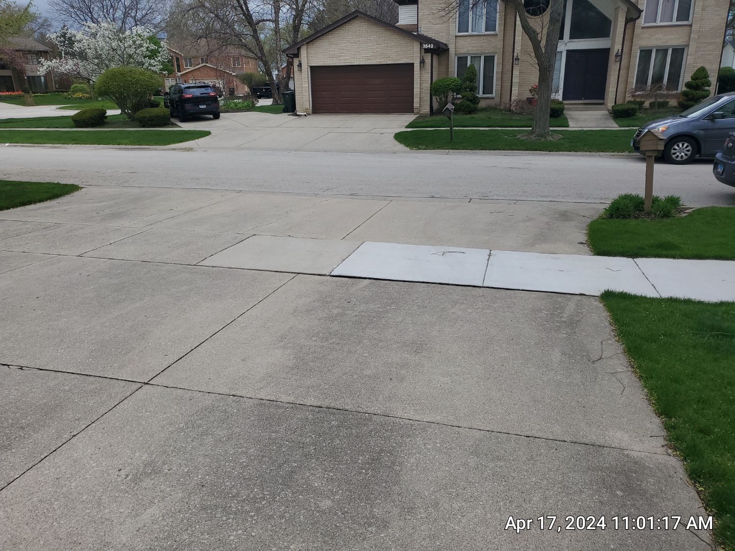 concrete patio and driveway cleaning by Northern Power Washing LLC.