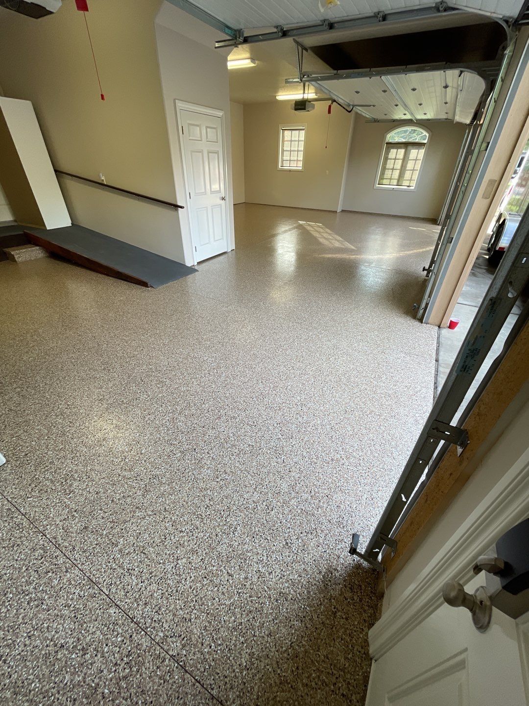 Garage Transformation using Sandstone by Croc Coatings, LLC