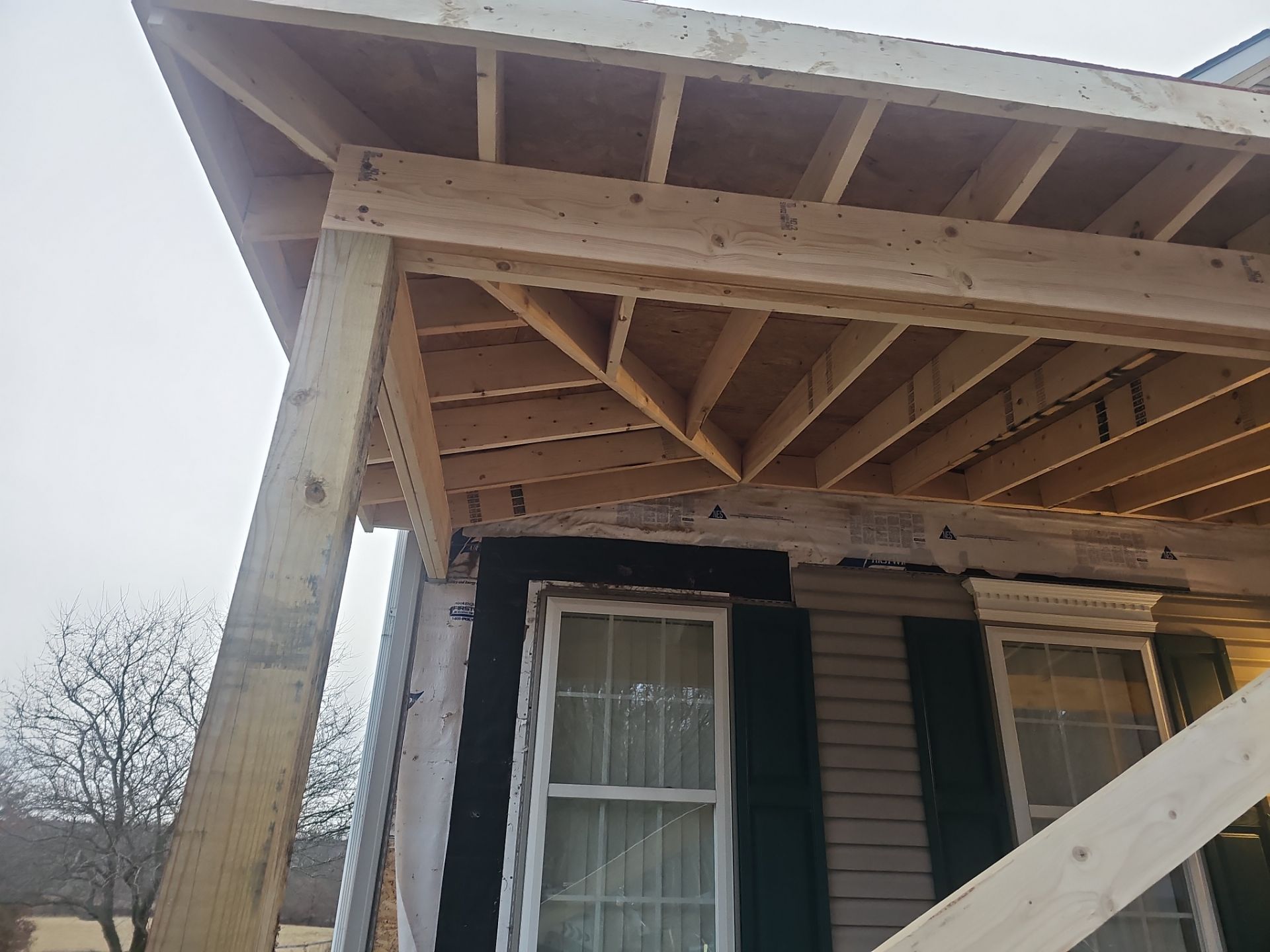 Porch by Cousins Roofing Siding & Decks