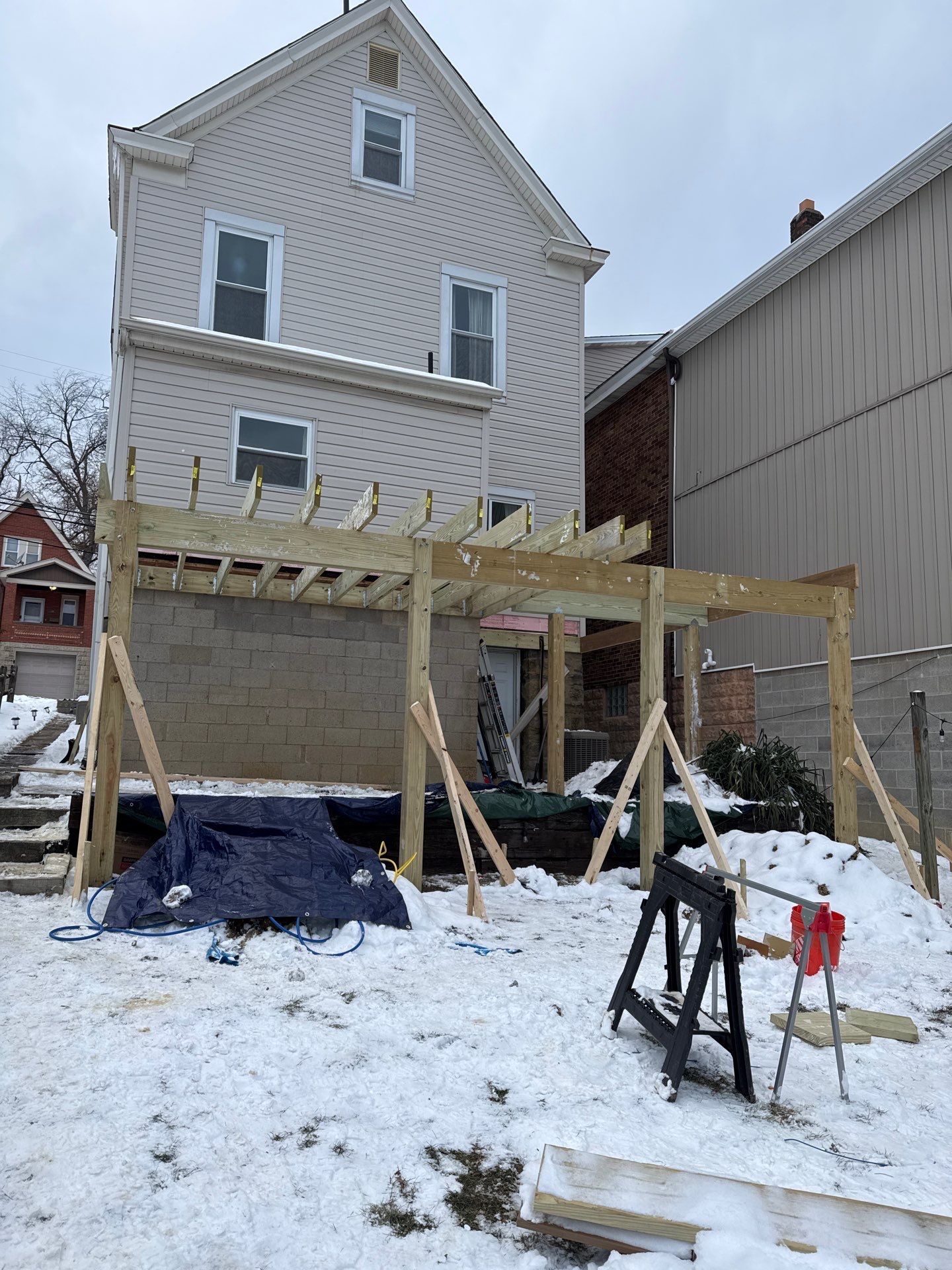 Deck and door by Cousins Roofing Siding & Decks