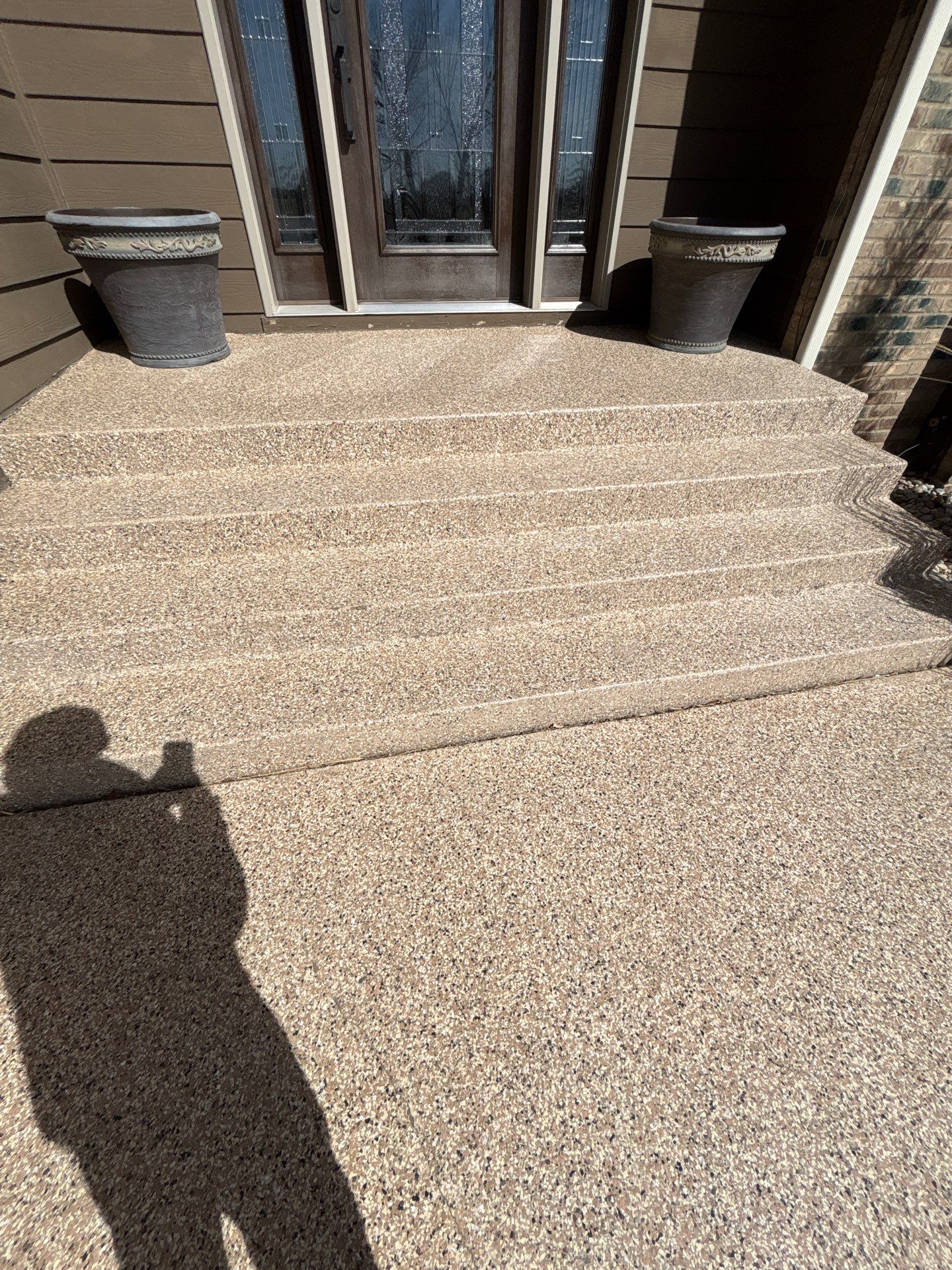 Full Exterior Renovation with Stone Veneer and Composite Decking by Select Painting, Coatings & Garage Cabinets