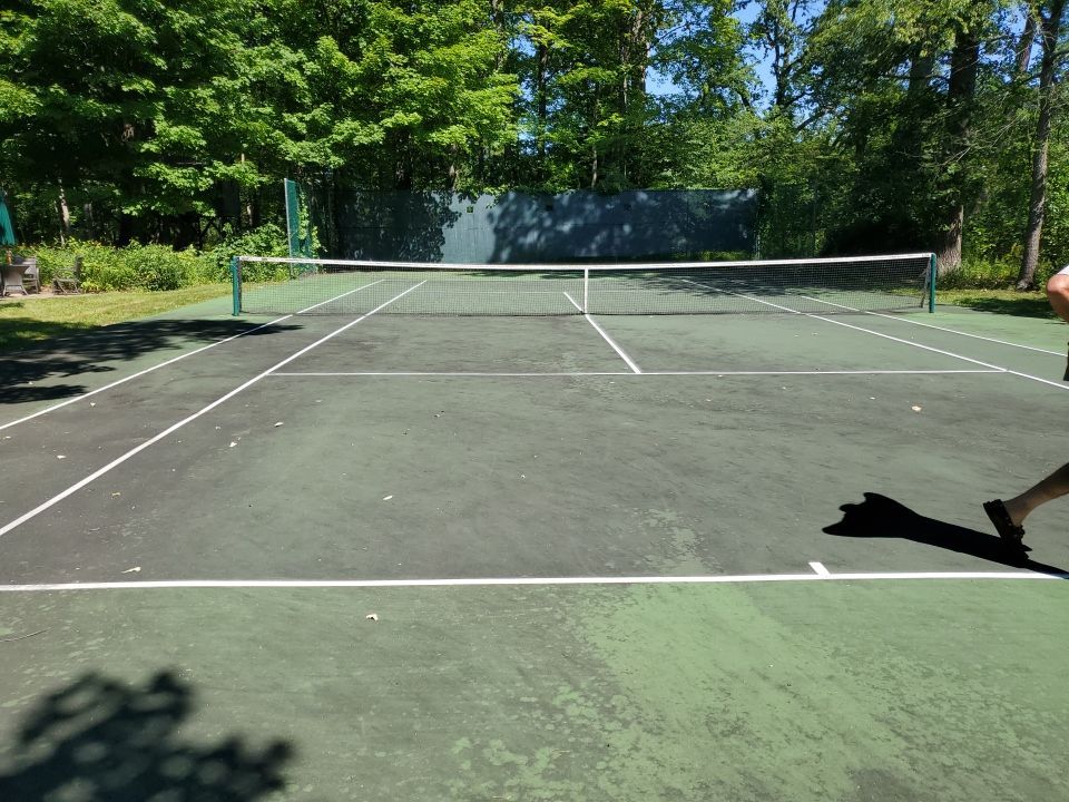 Deck, Patio, and Tennis Court Cleaning by Northern Power Washing LLC.