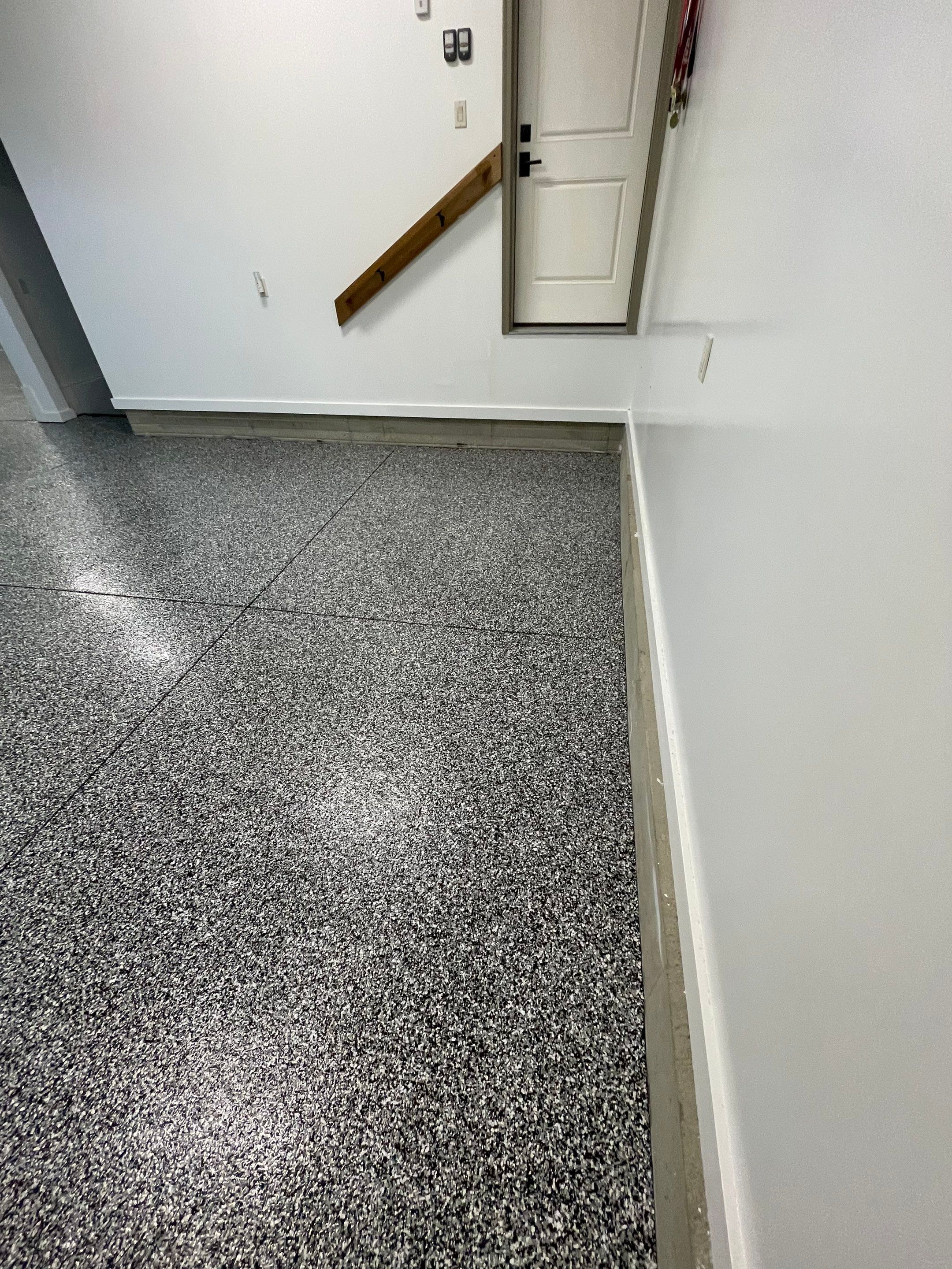 Garage Floor Coating and Domino Flake Finish in Sioux Falls by Select Painting, Coatings & Garage Cabinets