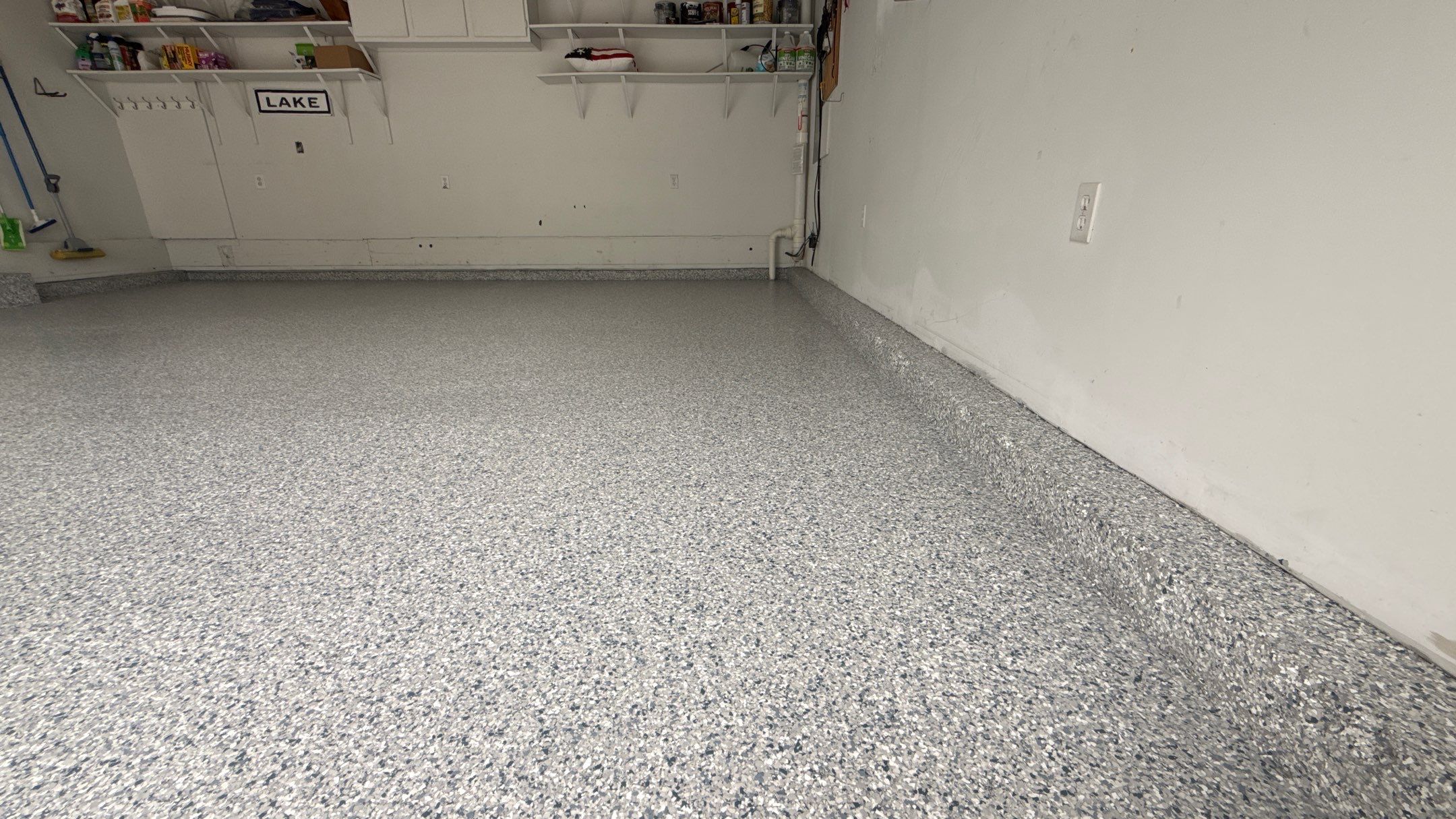 Another Beautiful Tidal Wave Flake Floor Looking Amazing  by Banner Garage