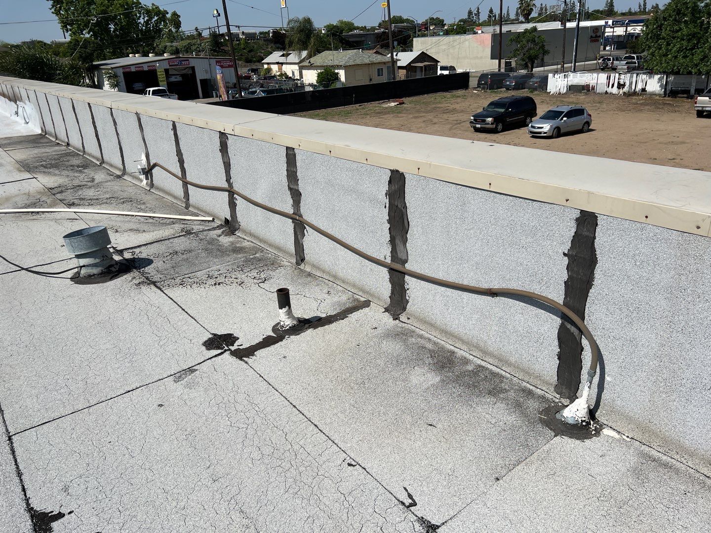 Spray foam and coatings using Conklin Benchmark/PUMA XL coatings and spray foam by Straight Edge Roofing Inc